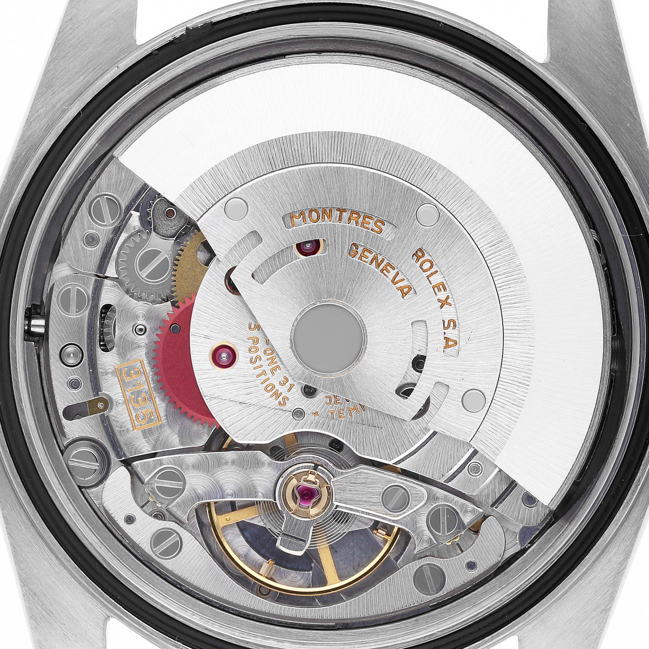 The image shows the internal mechanism of a Rolex Datejust 16233 Men's Steel and Gold (two tone) White Dial 16233 Men's Steel and Gold (two tone) White Dial watch, focusing on the movement and rotor from a top-down angle.
