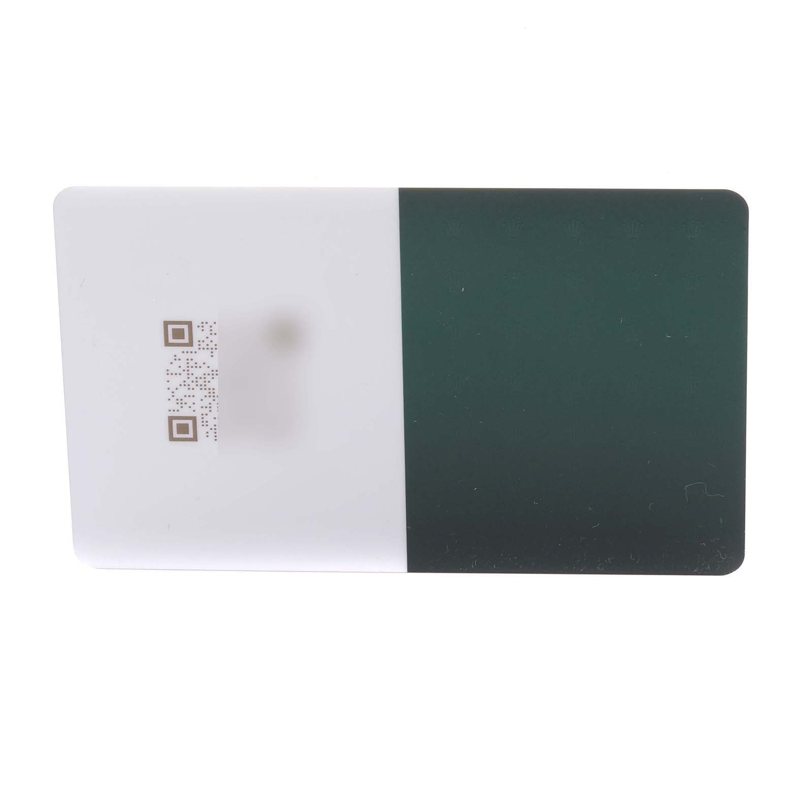 The image shows a warranty card for the Rolex Turn-o-Graph 16264 Men
s Stainless Steel Black Dial 16264 Men
s Stainless Steel Black Dial, featuring QR codes and green and white color blocks.