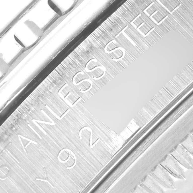 The image shows a close-up of the Rolex Turn-o-Graph 16264 Men
s Stainless Steel Black Dial 16264 Men
s Stainless Steel Black Dial
s engraved side, highlighting the stainless steel text and texture.