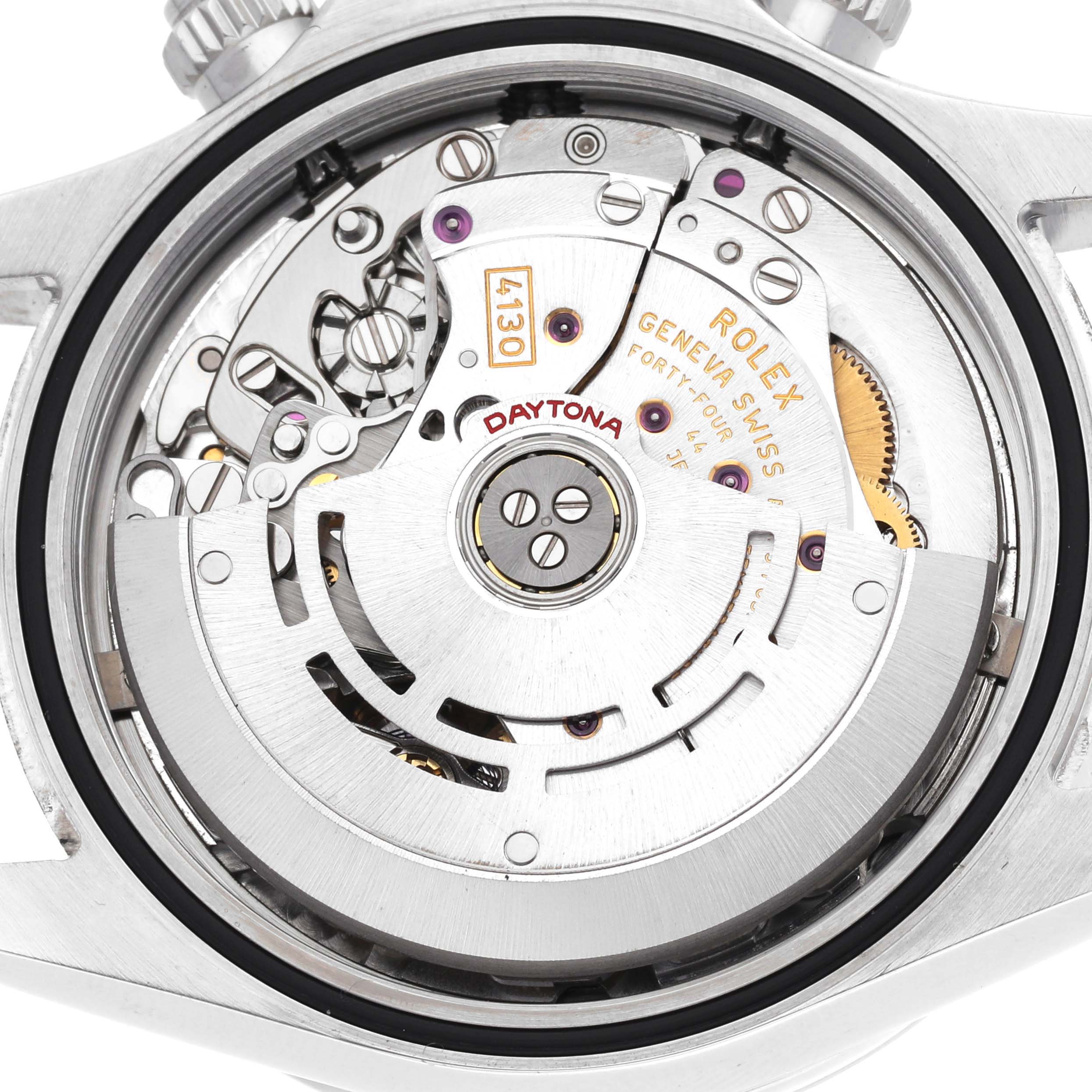 The image shows the back view of a Rolex Daytona 116520 Men's Stainless Steel Black Dial, featuring its intricate movement and rotor.