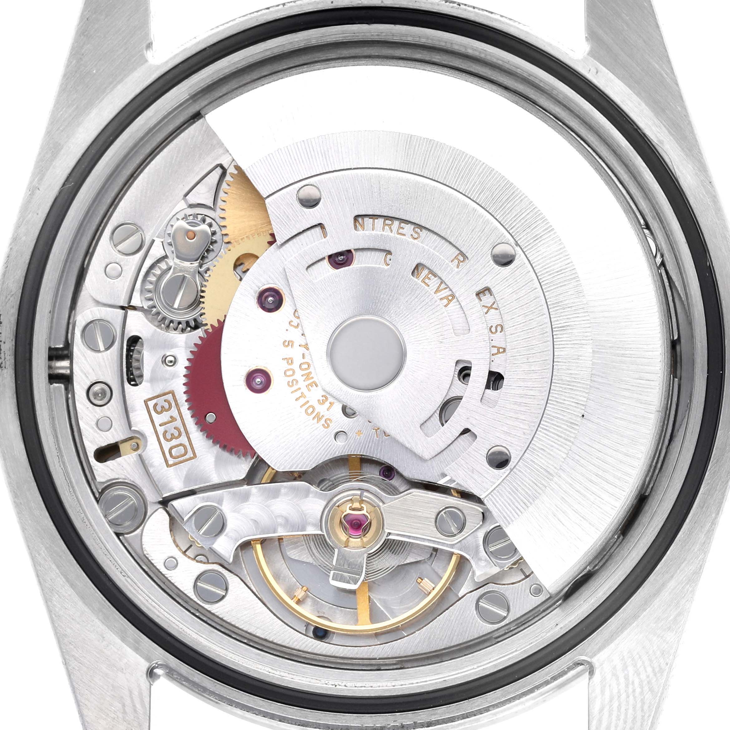 The image shows the internal mechanism of the Rolex Explorer 114270 Men's Stainless Steel Black Dial 114270 Men's Stainless Steel Black Dial, viewed from the back, highlighting the movement and rotor.