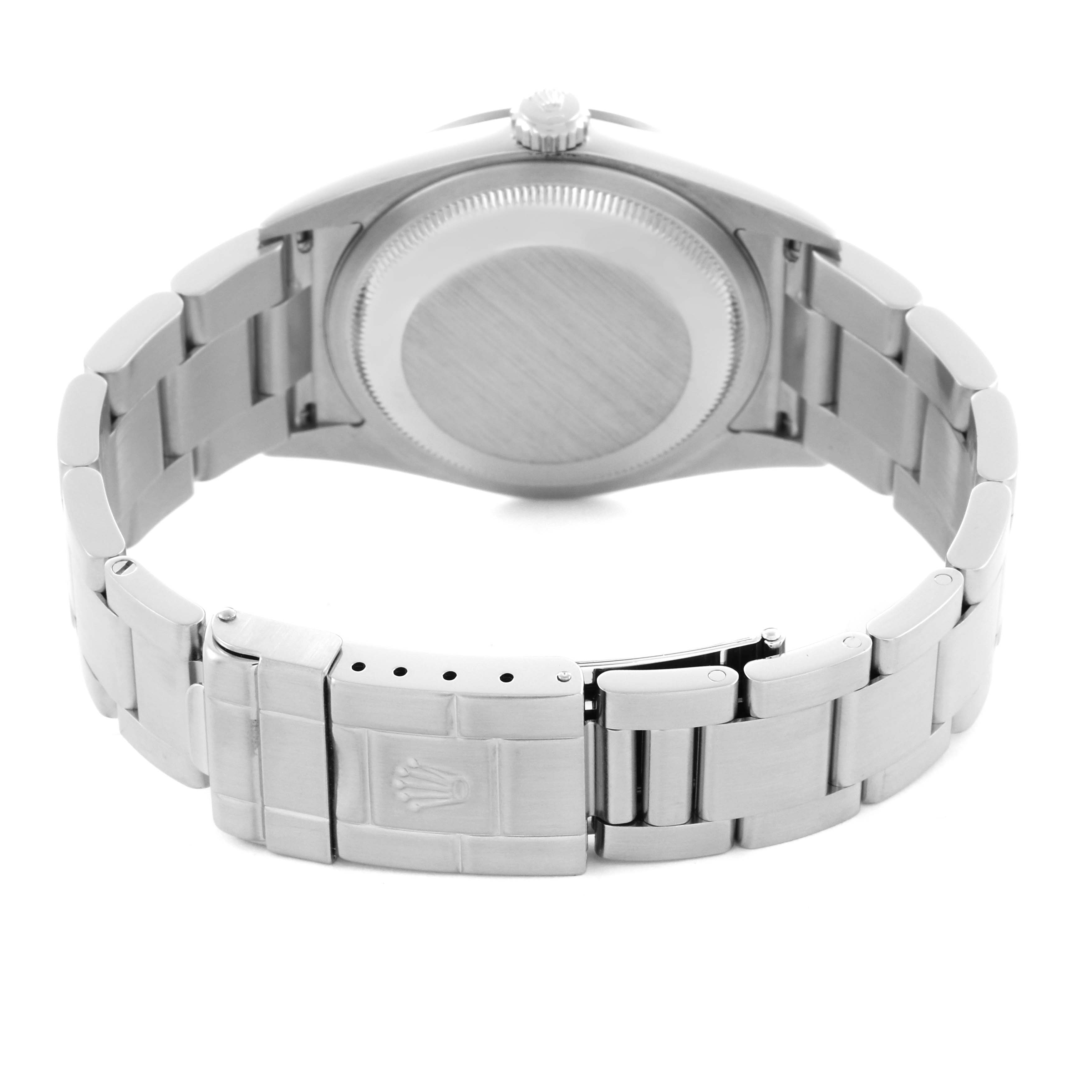 The image shows the rear angle of a Rolex Explorer 114270 Men's Stainless Steel Black Dial 114270 Men's Stainless Steel Black Dial's case back and bracelet with the clasp.