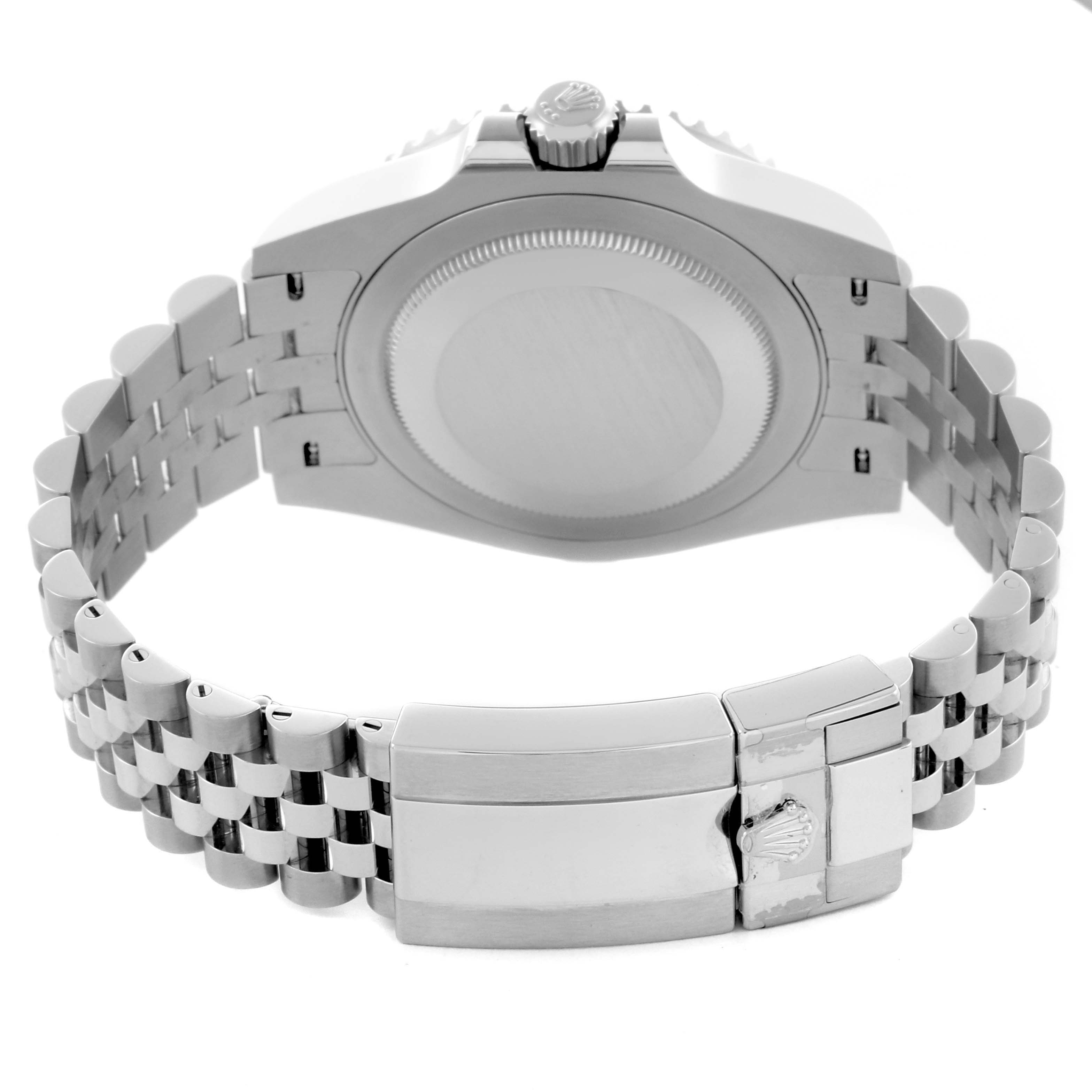 The image shows a rear view of the Rolex GMT-Master 126720VTNR Men's Stainless Steel Black Dial 126720VTNR Men's Stainless Steel Black Dial watch, highlighting the case back and bracelet clasp.