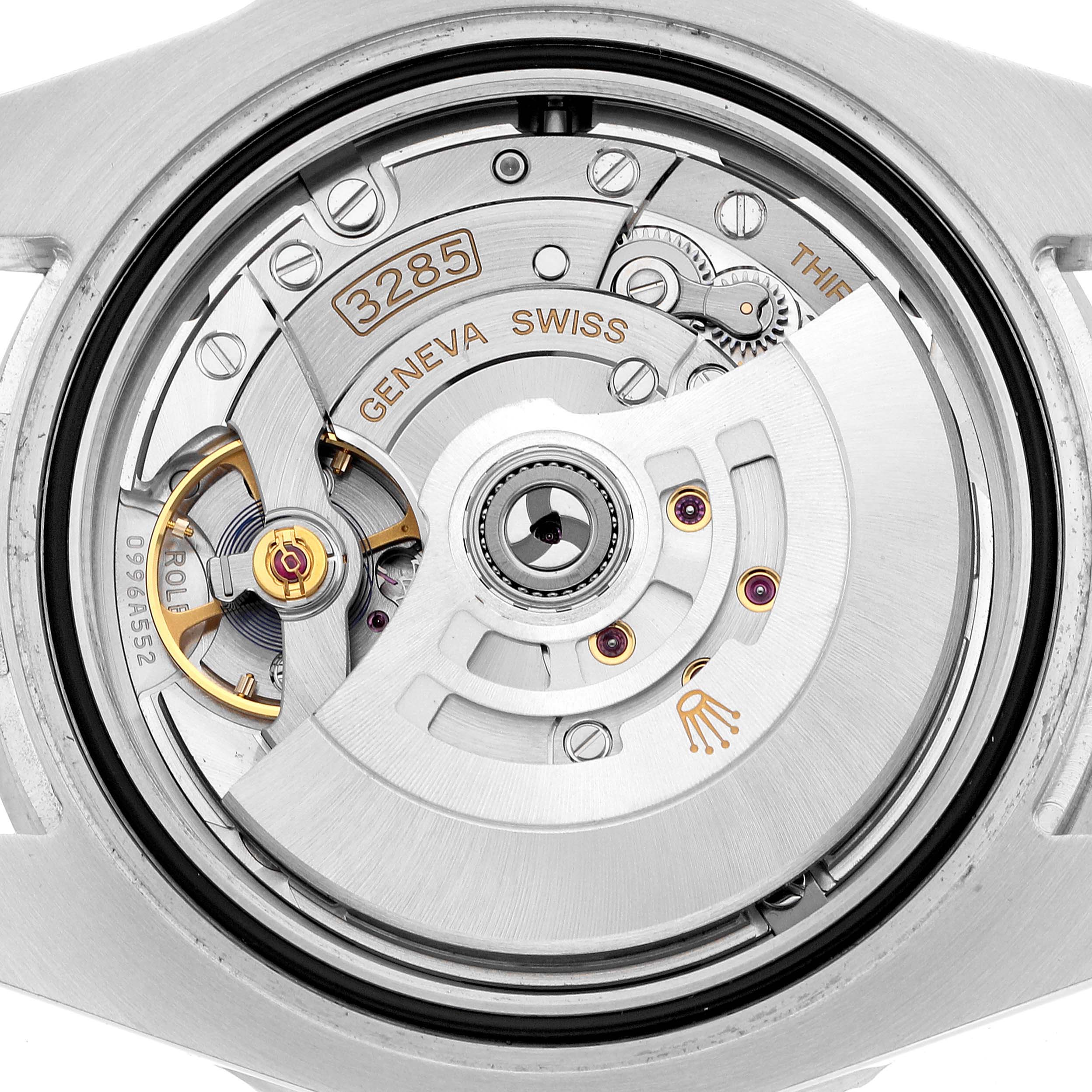 The image shows the Rolex GMT-Master 126710BLNR Men's Stainless Steel Black Dial's movement from the back, highlighting the rotor and intricate mechanics.