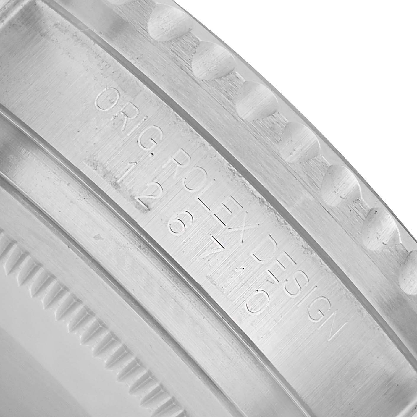 The image shows the engraved side of the bezel and case of a Rolex GMT-Master 126710BLNR Men's Stainless Steel Black Dial watch.