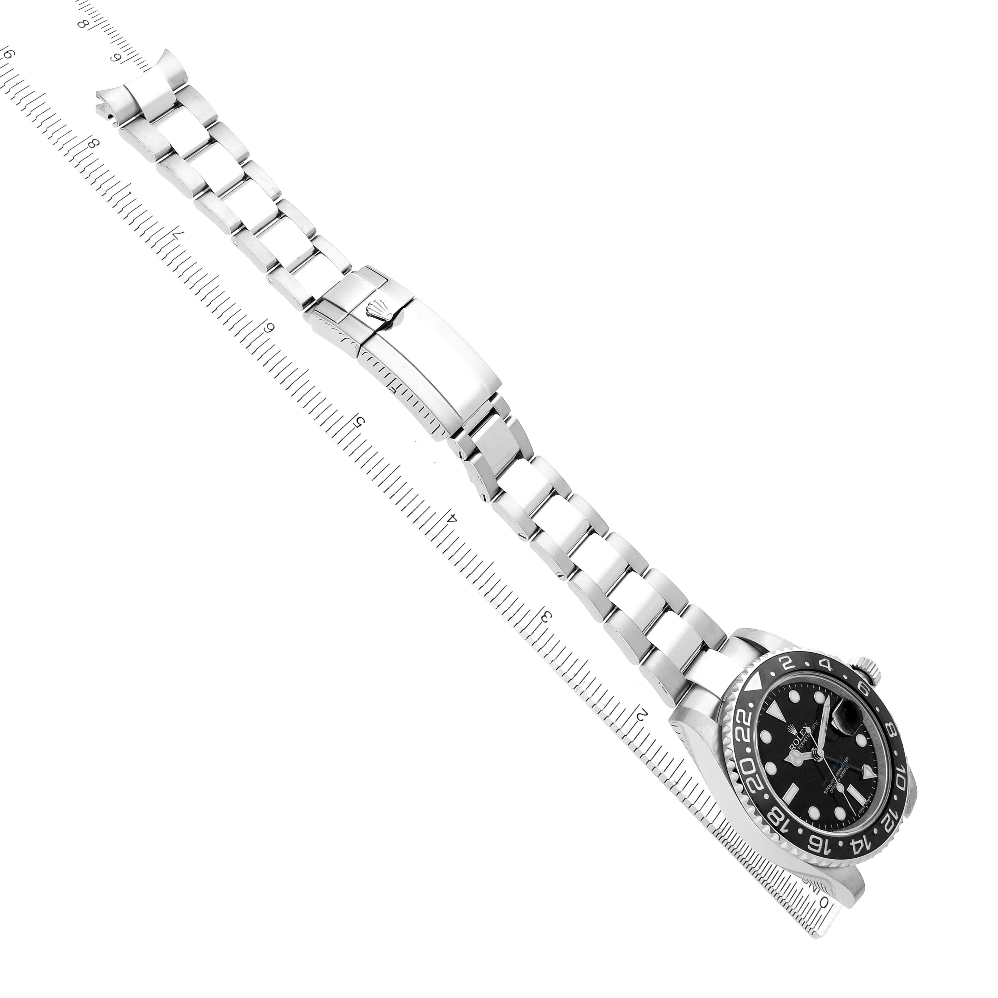 The image shows a top view of a Rolex GMT-Master 116710LN Men's Stainless Steel Black Dial watch, highlighting the bezel, dial, and full bracelet.