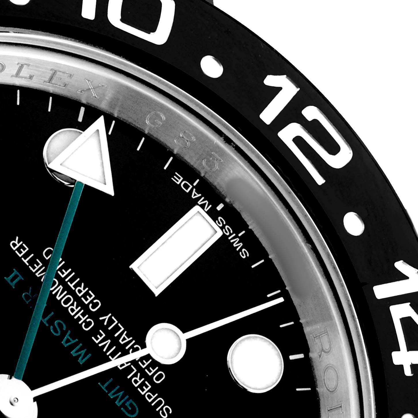 The image shows a close-up of the Rolex GMT-Master 116710LN Men's Stainless Steel Black Dial II's dial and bezel, highlighting the 12 and 14-hour markers.