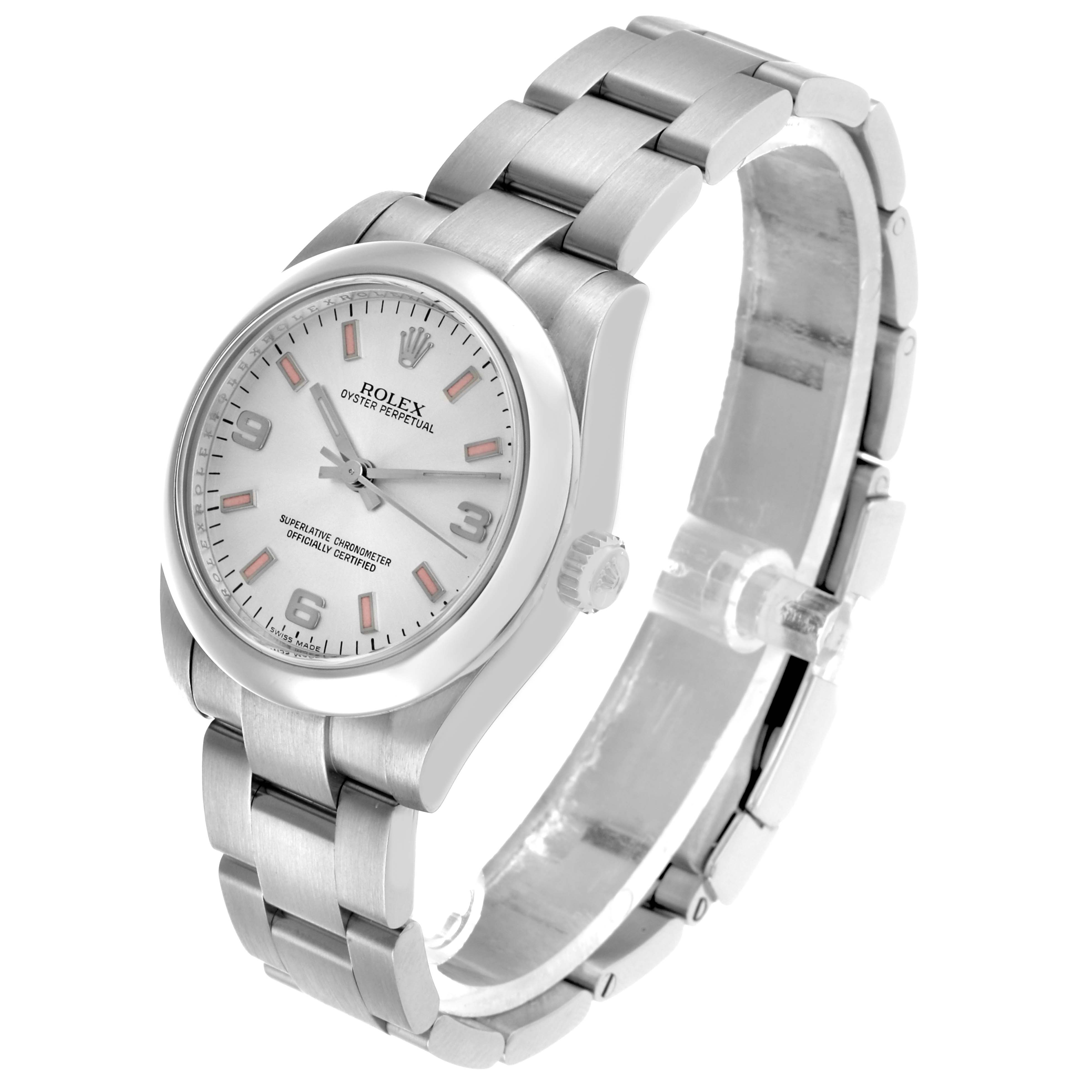 The Rolex Mid-Size 177200 Women's Stainless Steel Silver Dial watch is shown at a three-quarter angle highlighting the dial, bezel, crown, and bracelet.