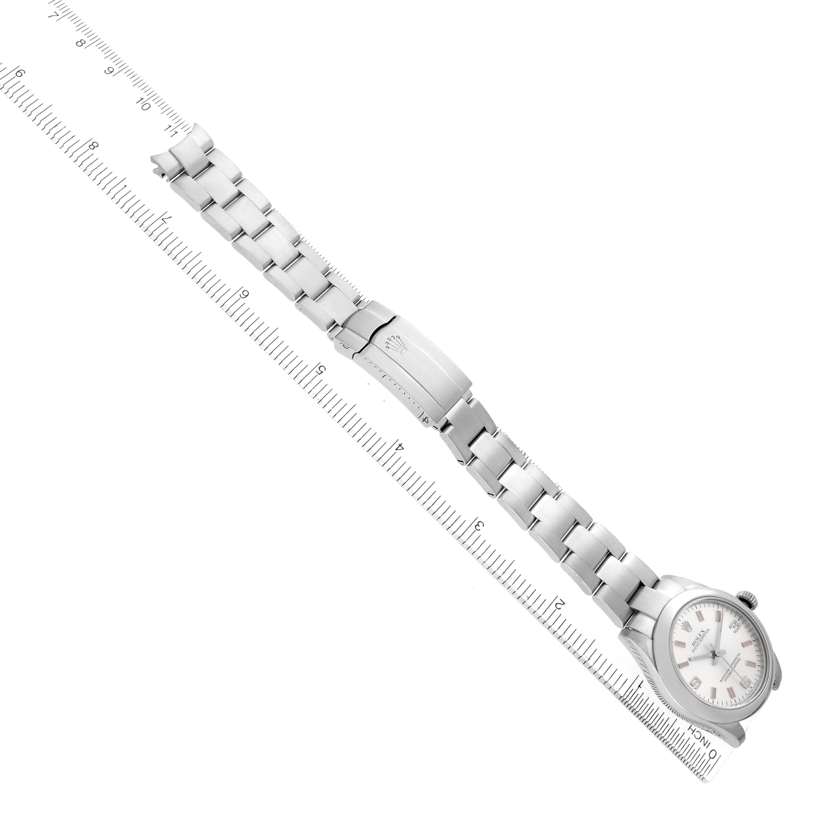 The image shows a Rolex Mid-Size 177200 Women's Stainless Steel Silver Dial watch laid flat, showcasing the bracelet, clasp, and face from a top-down angle.