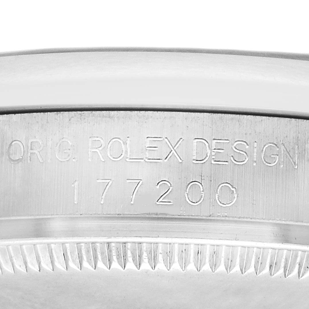 The image shows the side of a Rolex Mid-Size 177200 Women's Stainless Steel Silver Dial model watch, focusing on the engraved model number "177200" and text "ORIG. ROLEX DESIGN."