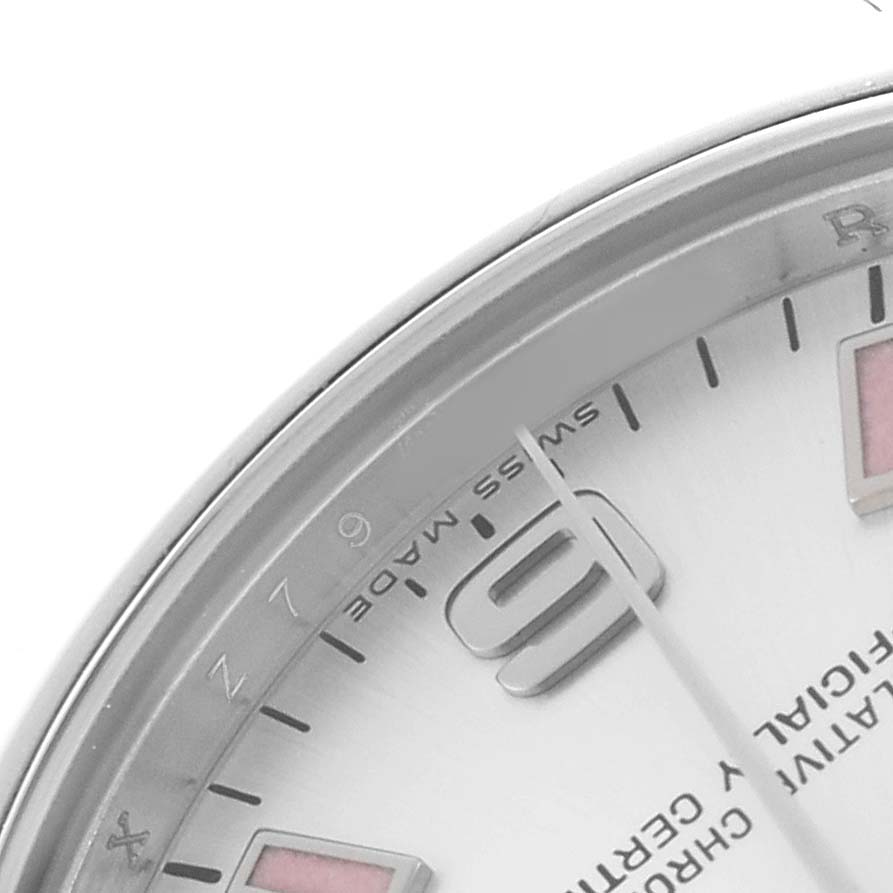 The image shows a close-up of the dial and bezel details of a Rolex Mid-Size 177200 Women's Stainless Steel Silver Dial watch, highlighting the "Swiss Made" text.