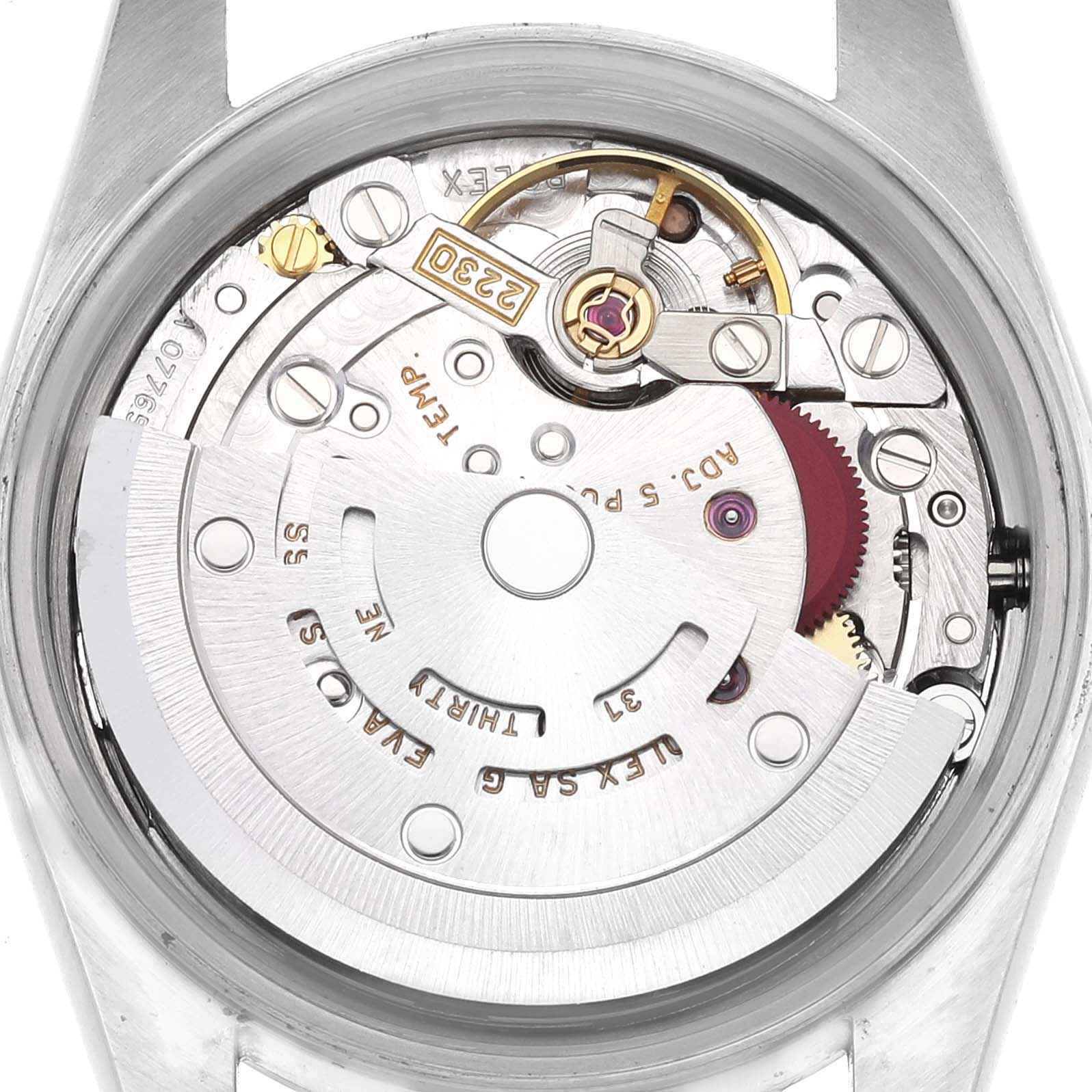 The image shows the movement and rotor of a Rolex Oyster Perpetual 76080 Women's Stainless Steel Pink Dial 76080 Women's Stainless Steel Pink Dial watch from a back view.