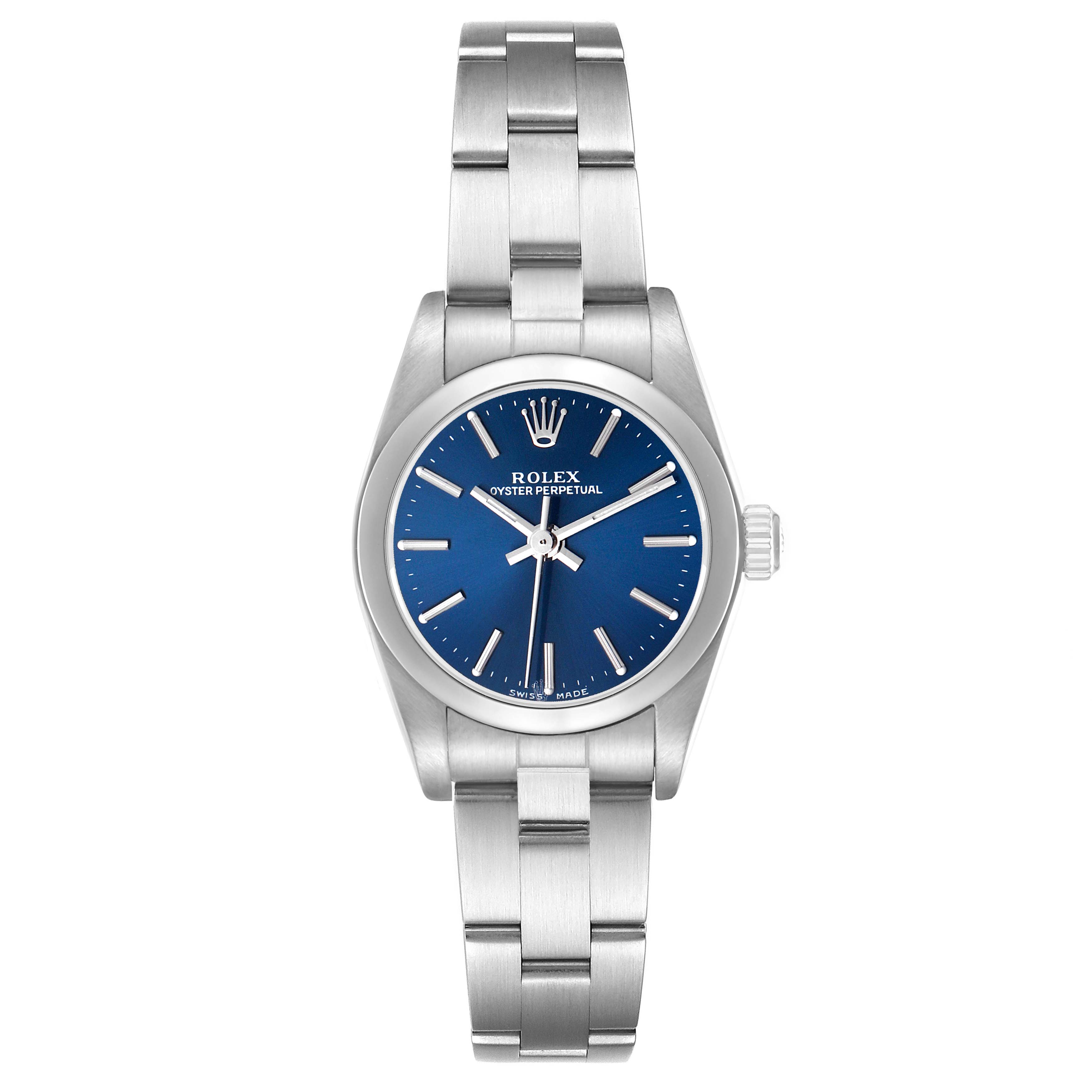The Rolex Oyster Perpetual 76080 Women's Stainless Steel Blue Dial watch is shown from the front, displaying the full face, bezel, crown, and bracelet.