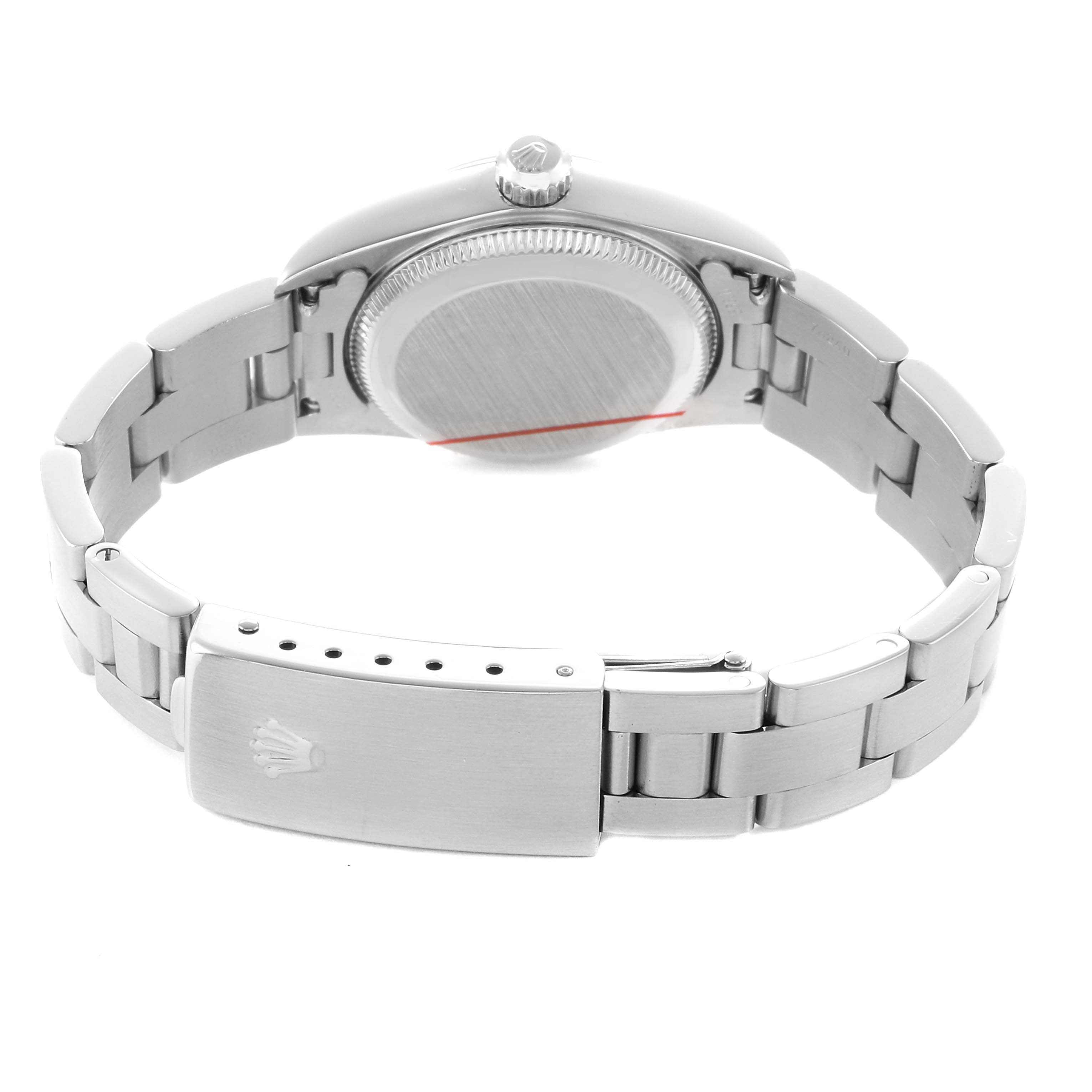 The image shows the back and bracelet of a Rolex Oyster Perpetual 76080 Women's Stainless Steel Blue Dial, highlighting the clasp and case back.