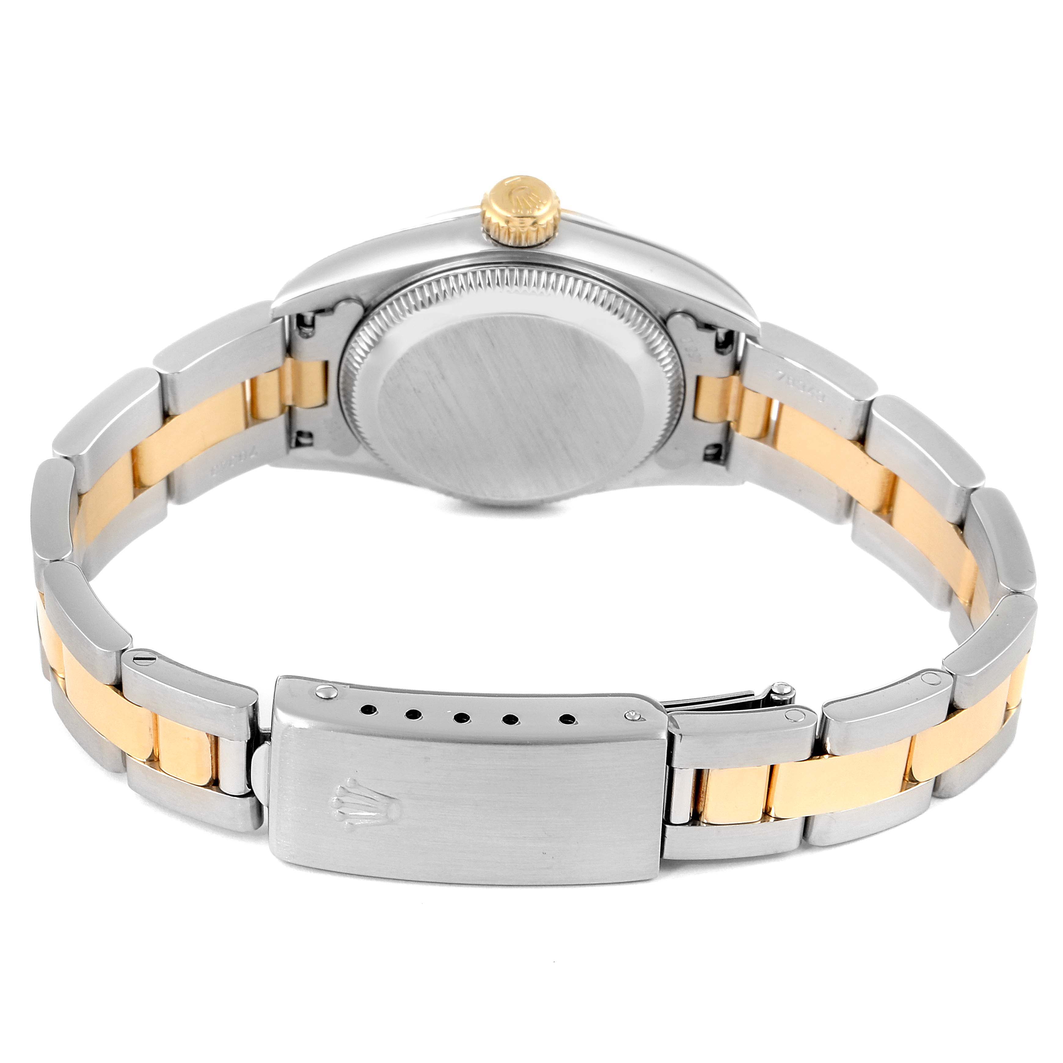 The image shows the back view of a Rolex Oyster Perpetual 67183 Women
s Steel and Gold (two tone) White Dial 67183 Women
s Steel and Gold (two tone) White Dial watch, highlighting the case back, bracelet, and clasp.