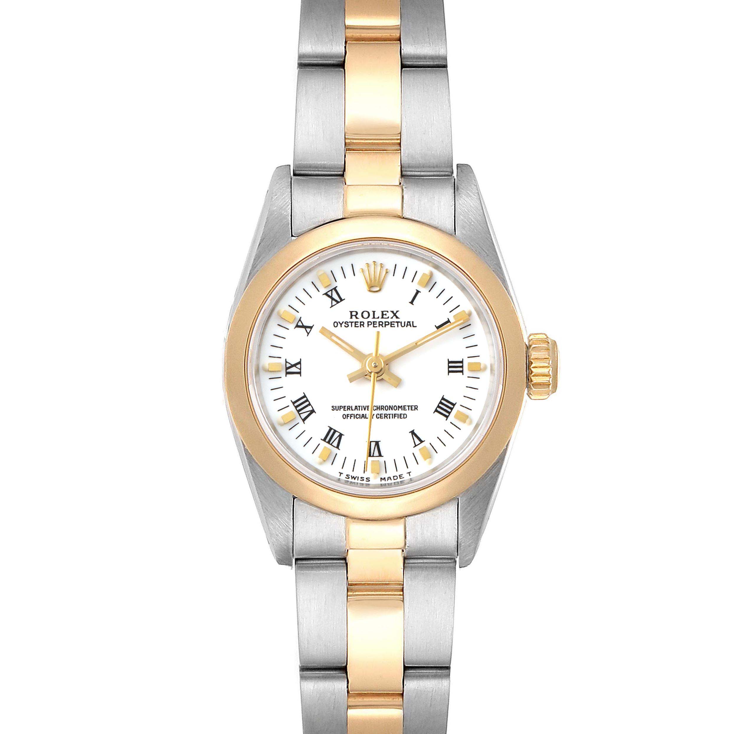 This is a front view of a Rolex Oyster Perpetual 67183 Women
s Steel and Gold (two tone) White Dial 67183 Women
s Steel and Gold (two tone) White Dial watch, showcasing its two-tone metal bracelet, white dial, and gold bezel.