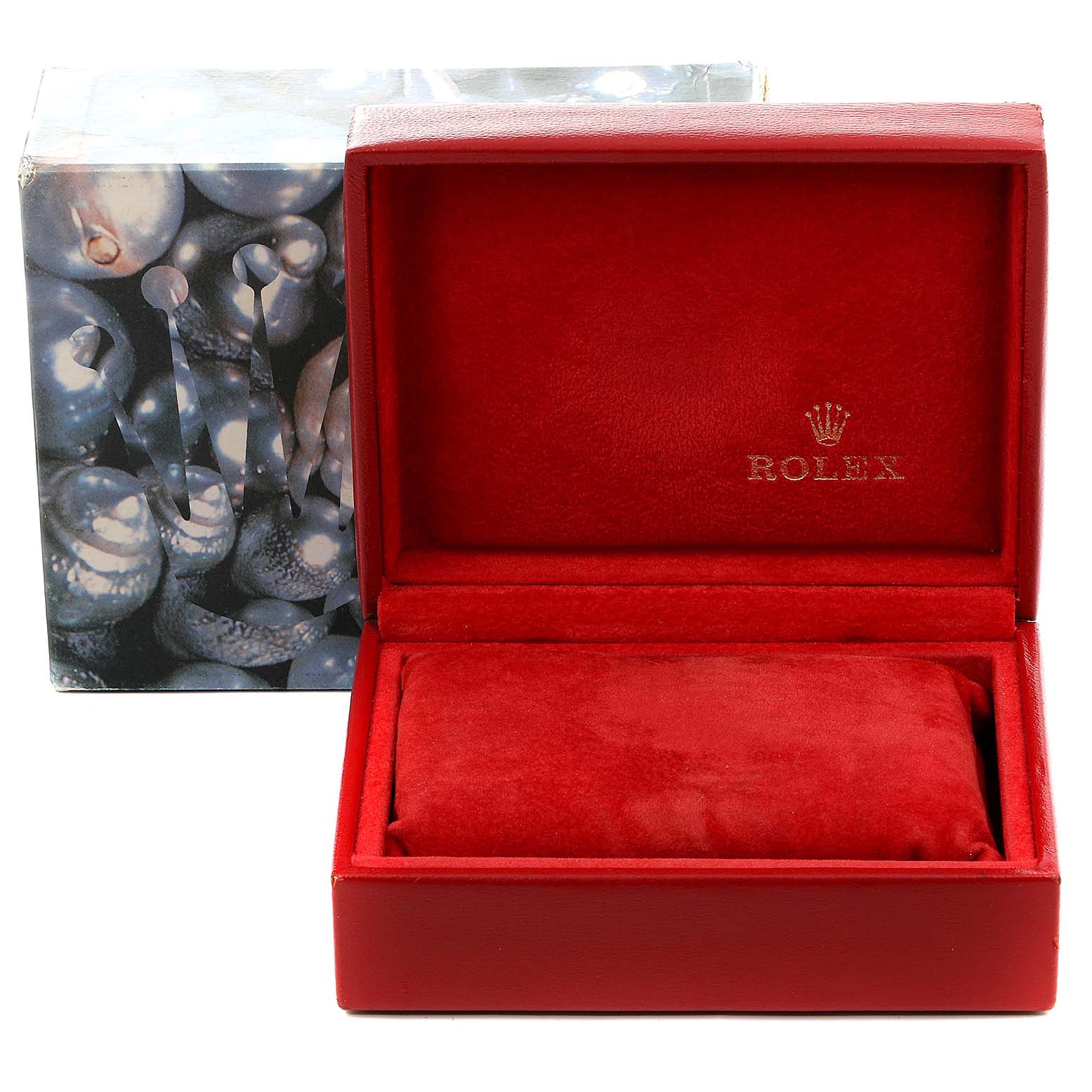 This image shows an empty red Rolex watch box for the Oyster Perpetual model.