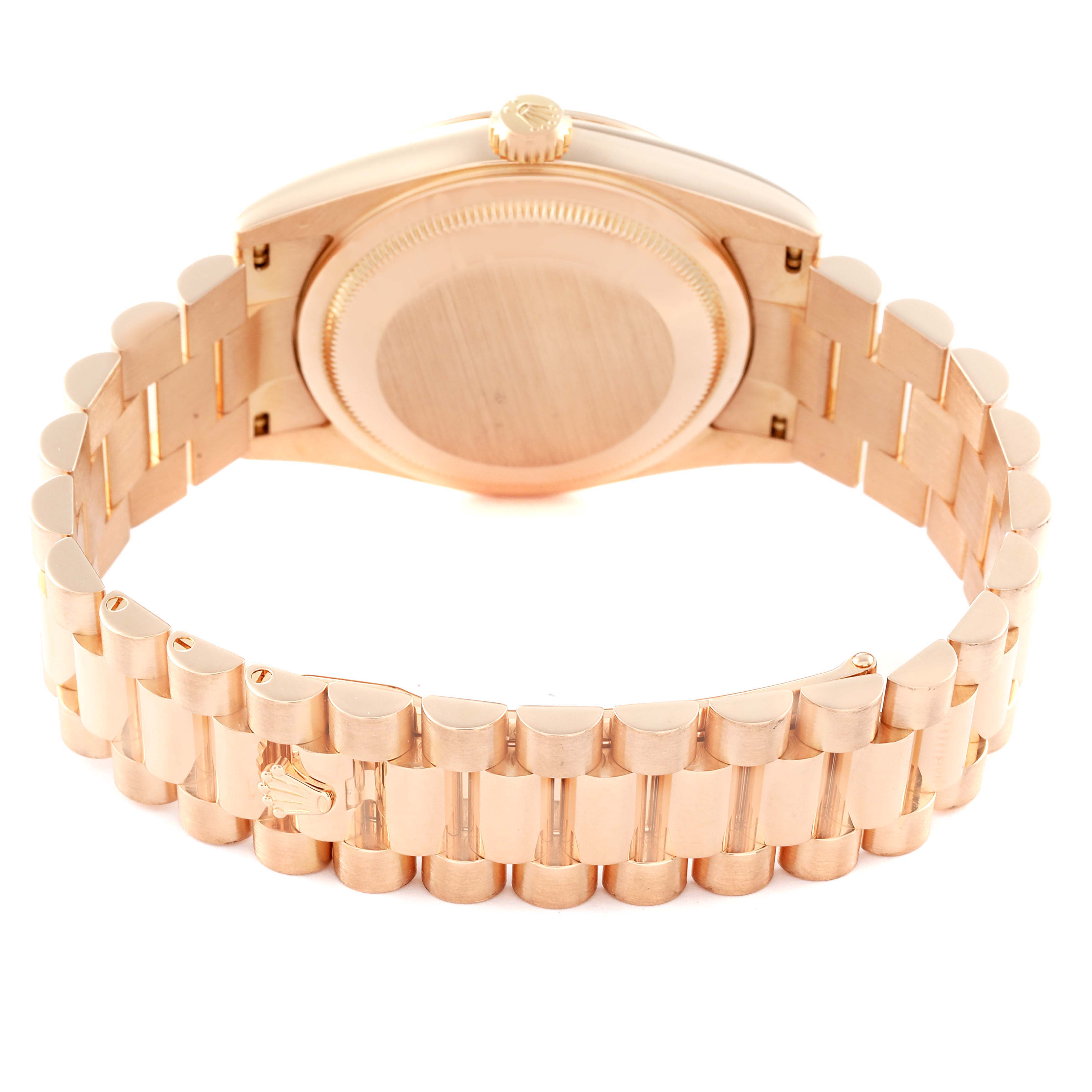 The image shows the back view of a Rolex President 118235 Men's Rose Gold Black Dial 118235 Men's Rose Gold Black Dial model, highlighting its case back and bracelet.