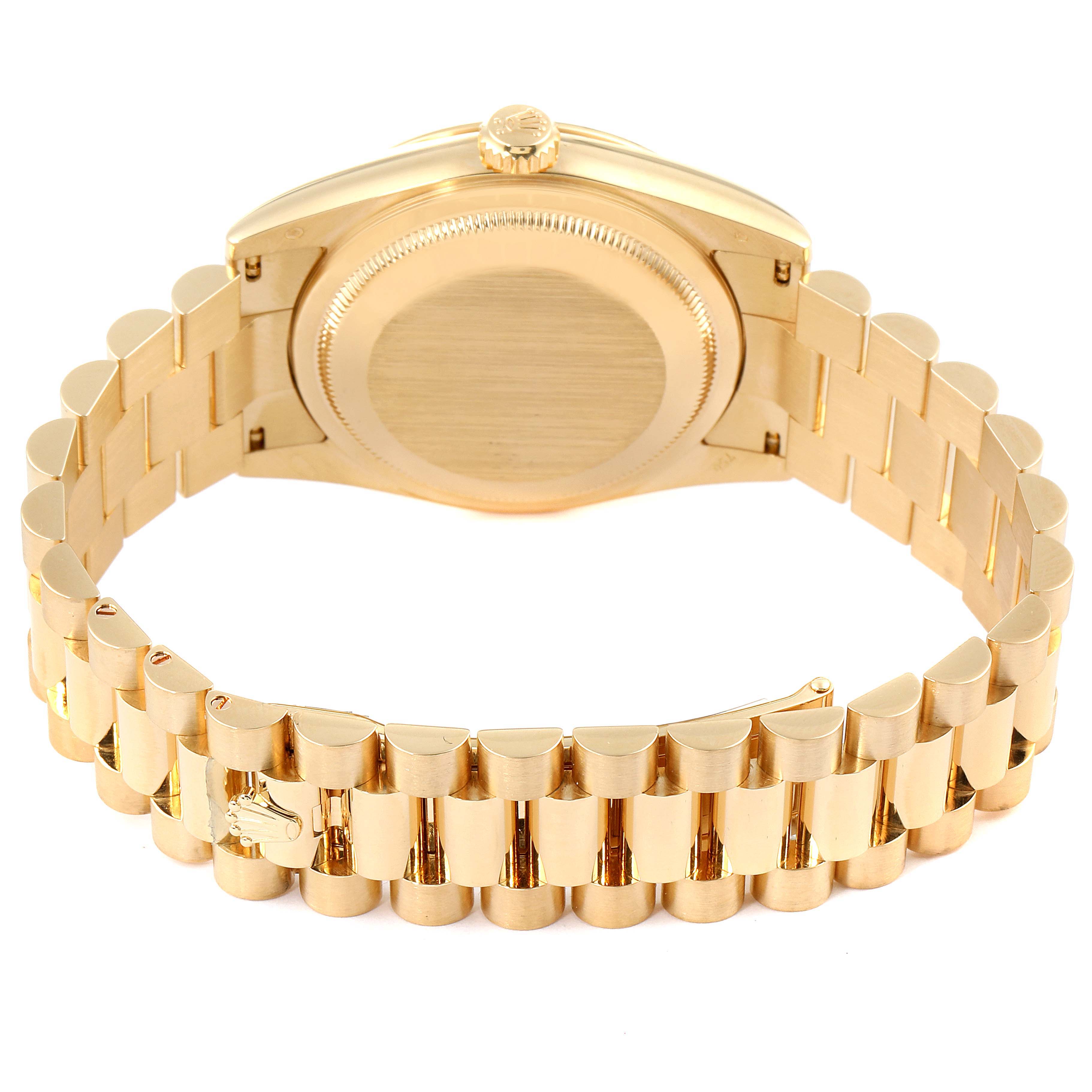 The image shows the back casing and bracelet of a Rolex President 118238 Men
s Yellow Gold Champagne Dial 118238 Men
s Yellow Gold Champagne Dial model watch from a rear angle.