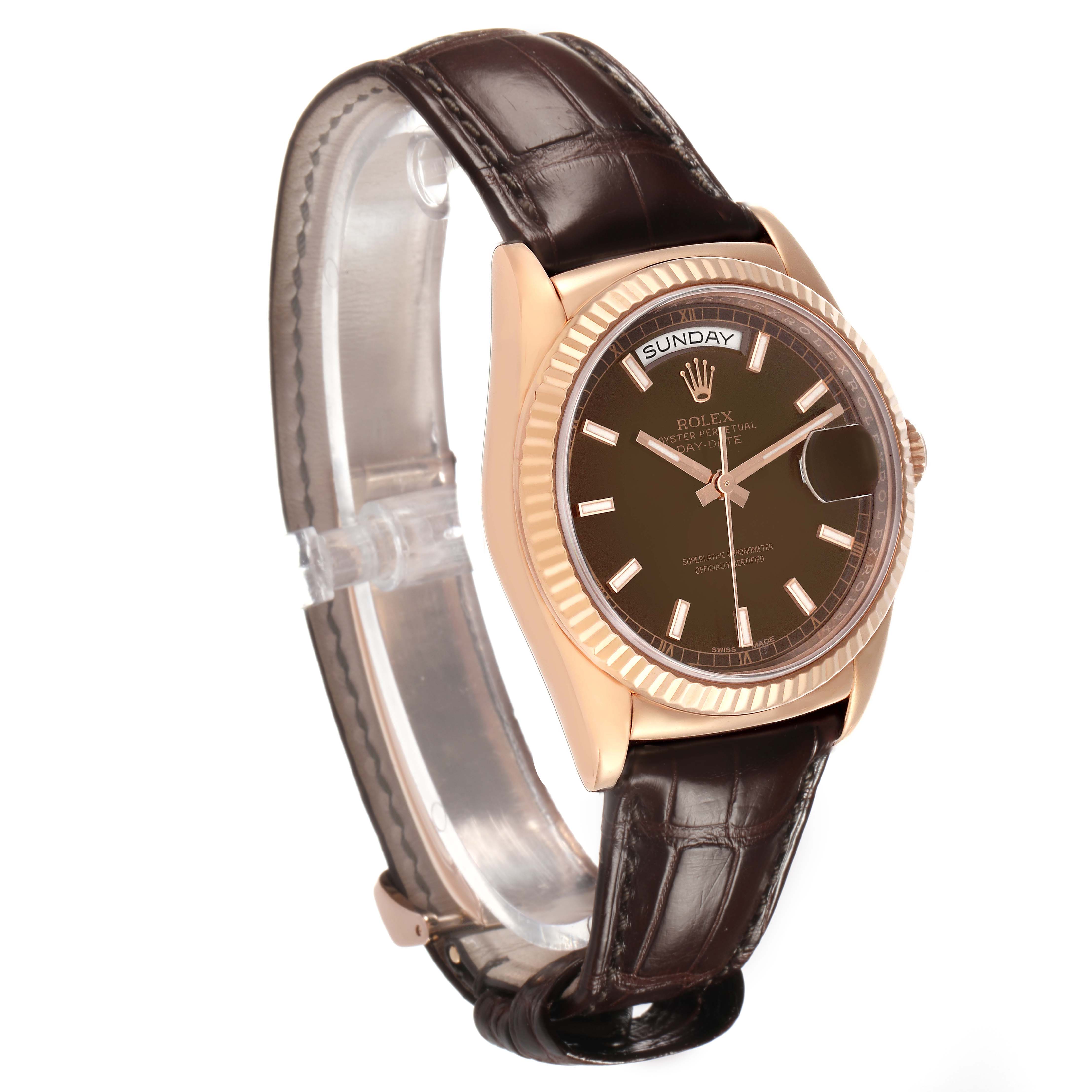 The image shows a side view of the Rolex President 118135 Men's Rose Gold Brown Dial model, highlighting the dial, fluted bezel, and leather strap.