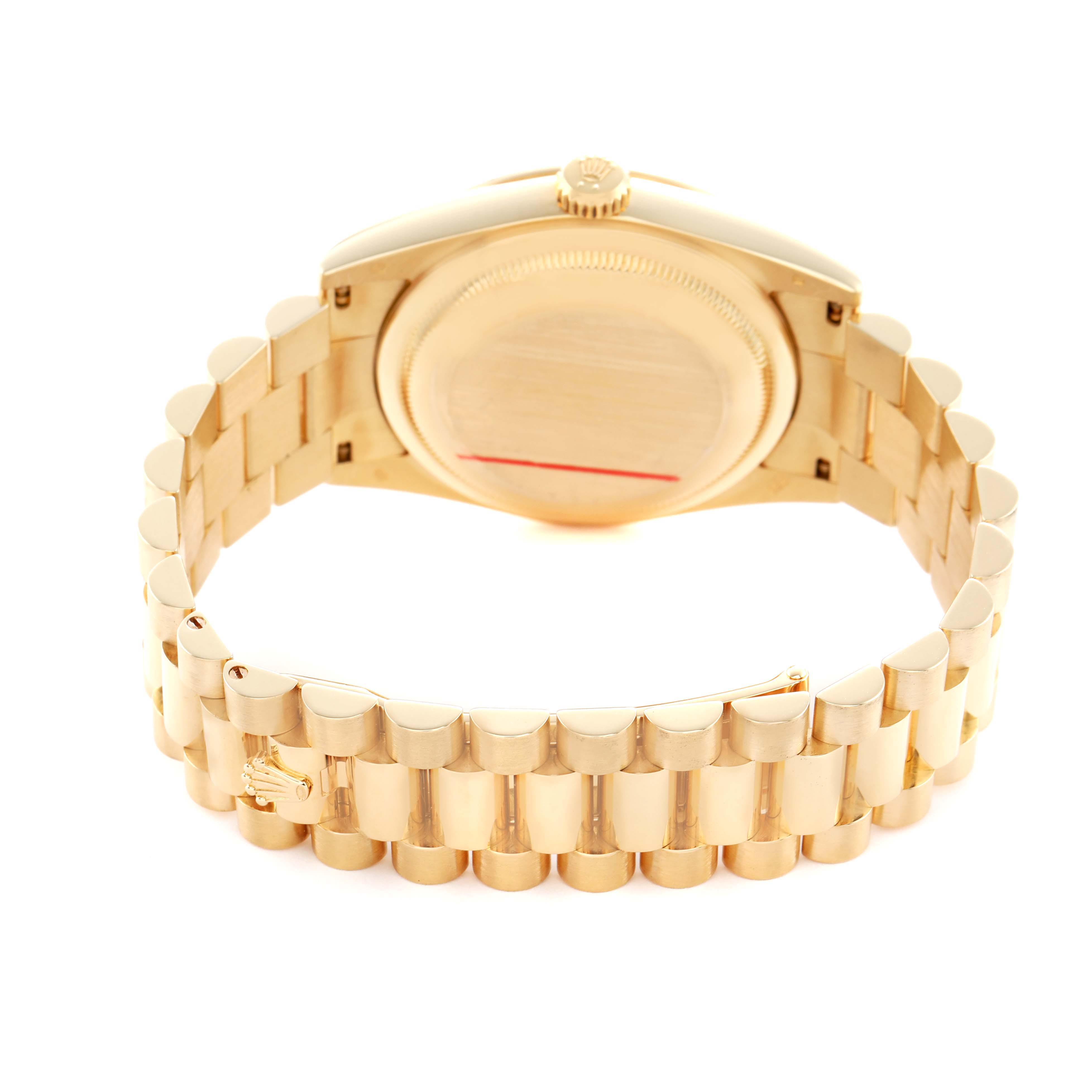 The image shows the back and bracelet of a Rolex President 118238 Men's Yellow Gold Champagne Dial model, highlighting the crown and clasp from the rear angle.