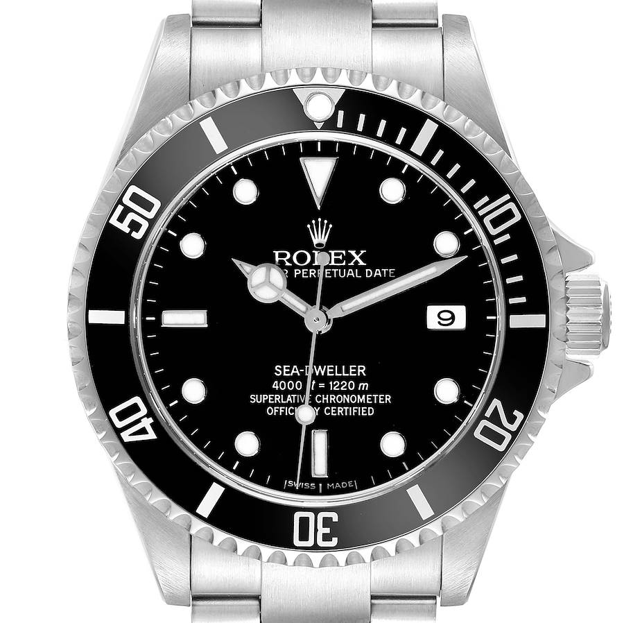 The Rolex Sea-Dweller watch is shown from a top view highlighting the dial, bezel, and part of the bracelet.