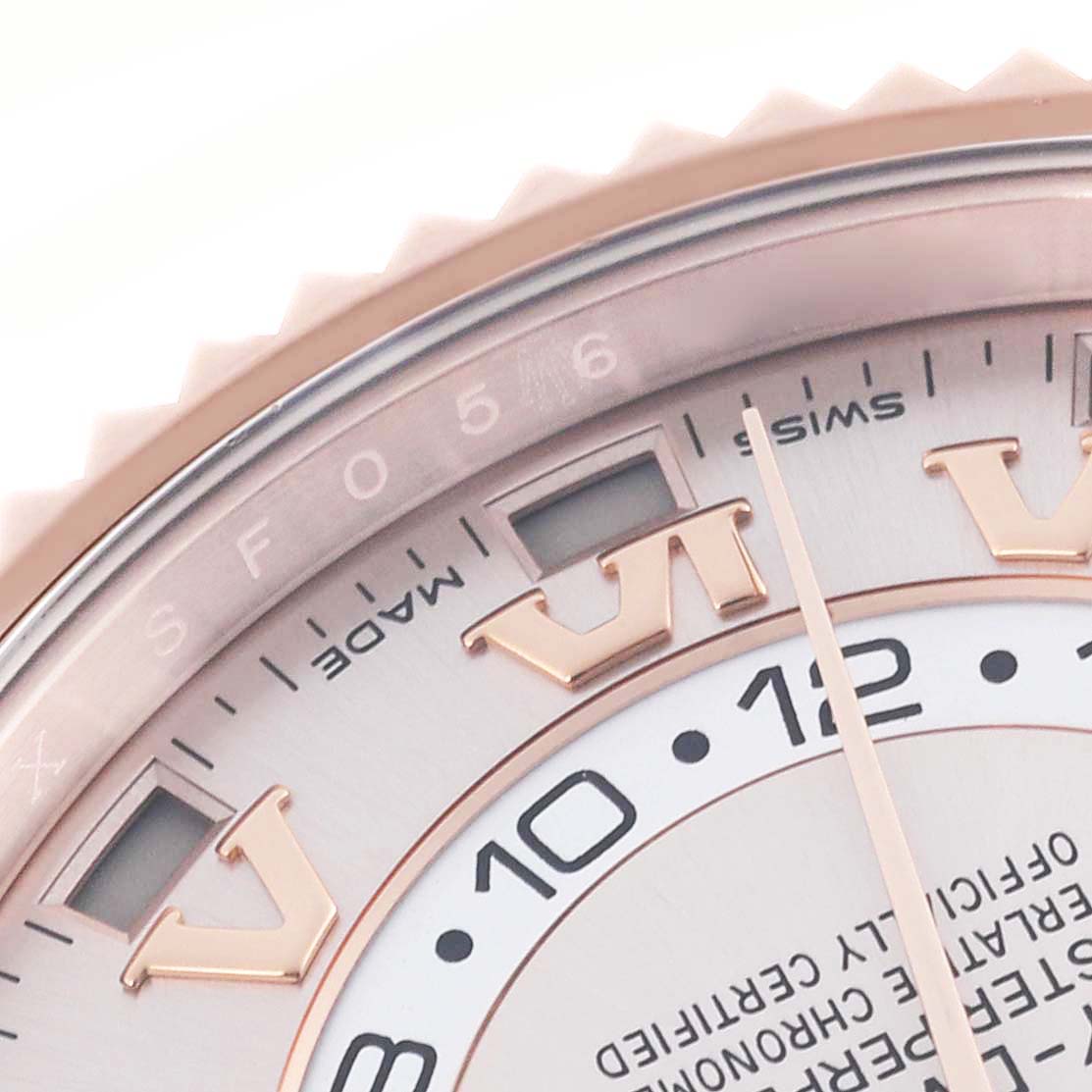 The image shows a close-up of the Rolex Sky-Dweller 326935 Men's Rose Gold Pink Dial 326935 Men's Rose Gold Pink Dial's dial, highlighting the Roman numeral markers and partial date indicator.