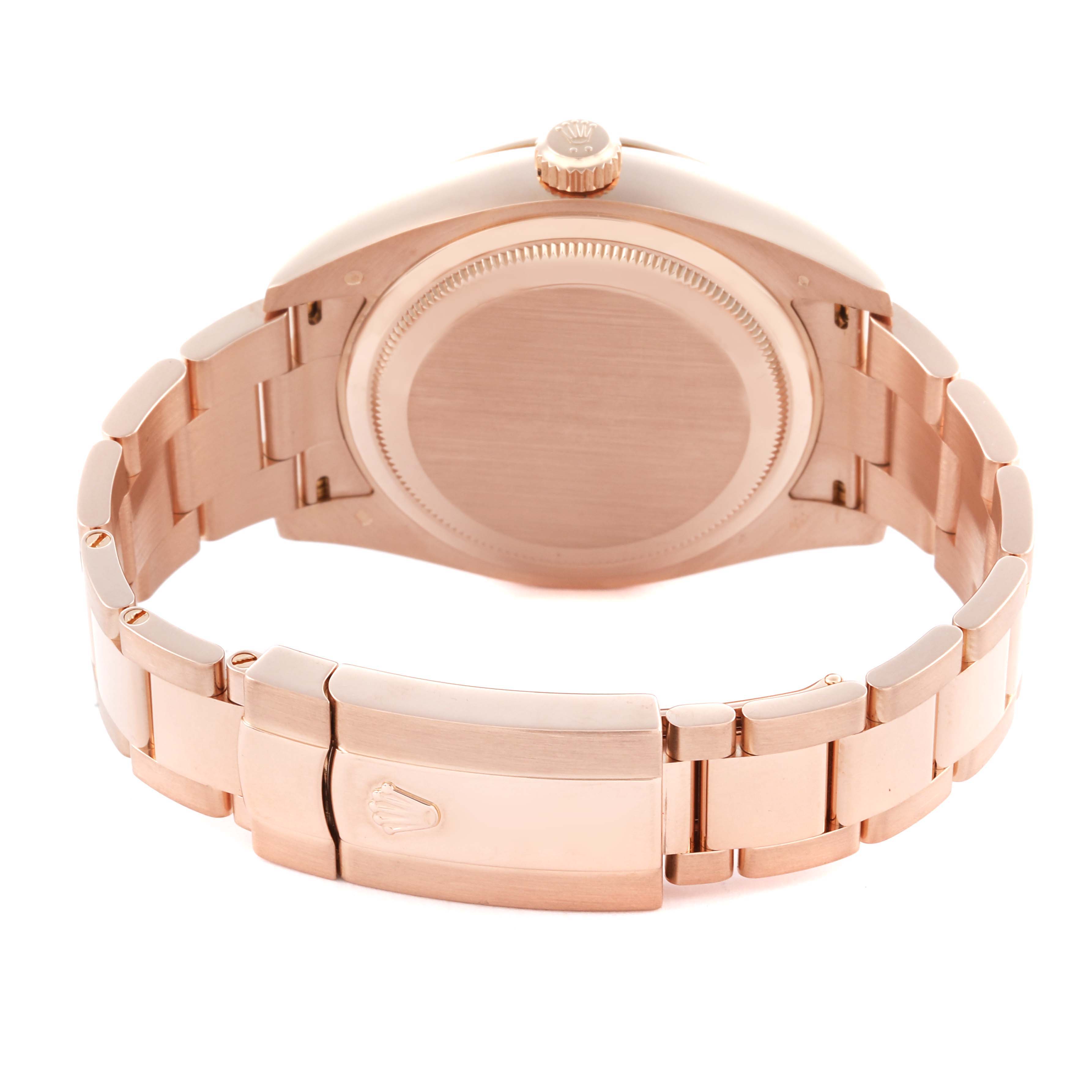 The image shows the back of the Rolex Sky-Dweller 326935 Men's Rose Gold Pink Dial 326935 Men's Rose Gold Pink Dial watch, focusing on the case back and bracelet clasp.