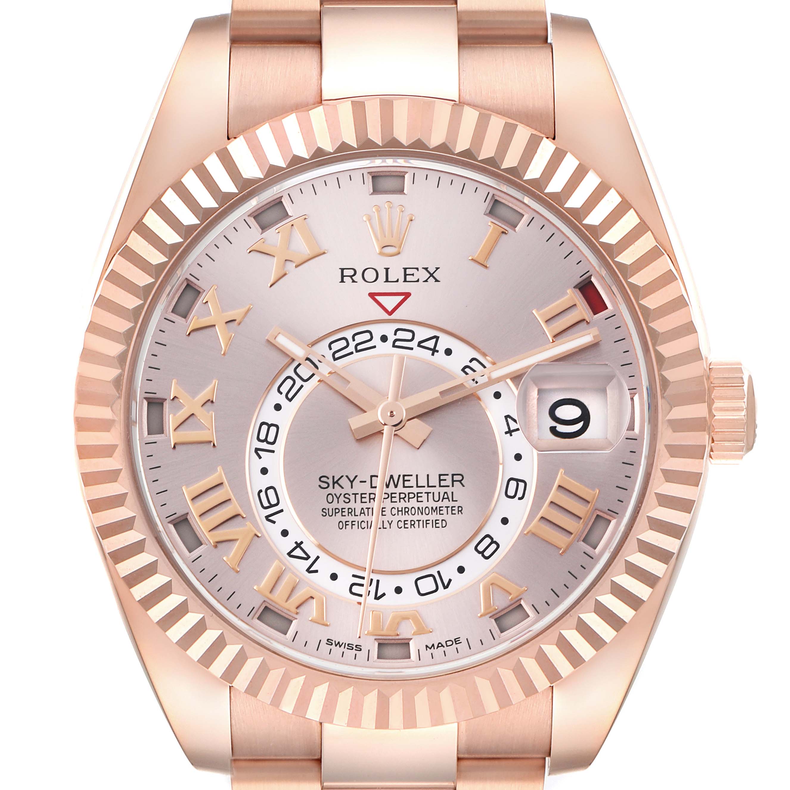 The Rolex Sky-Dweller 326935 Men's Rose Gold Pink Dial 326935 Men's Rose Gold Pink Dial watch is shown from the front, displaying the dial, bezel, and part of the bracelet.