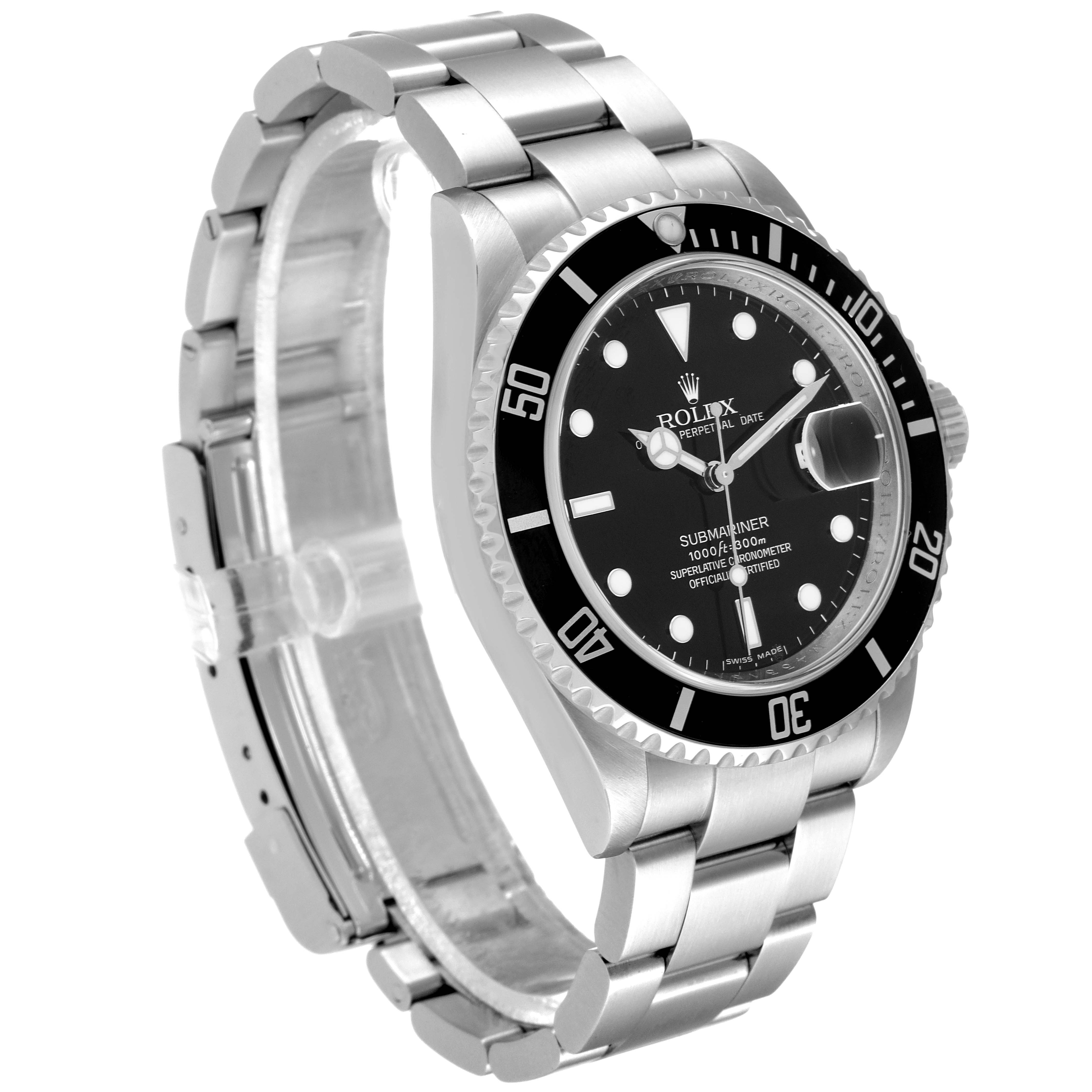 The Rolex Submariner 16610 Men
s Stainless Steel Black Dial 16610 Men
s Stainless Steel Black Dial watch is shown at an angled side view, displaying its bezel, dial, bracelet, and clasp.
