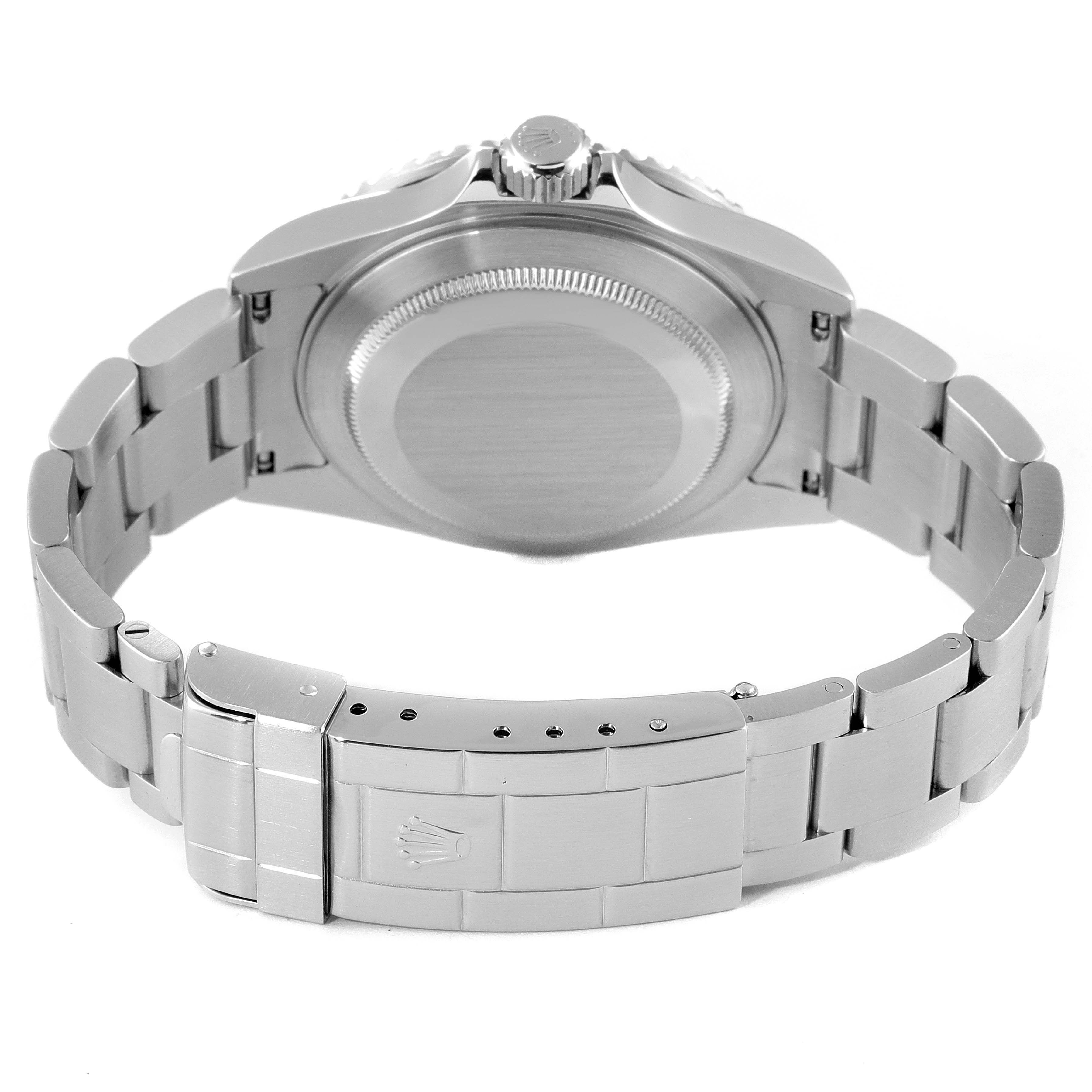 The image shows the back view of a Rolex Submariner 16610 Men
s Stainless Steel Black Dial 16610 Men
s Stainless Steel Black Dial watch, focusing on the case back, bracelet, and clasp.