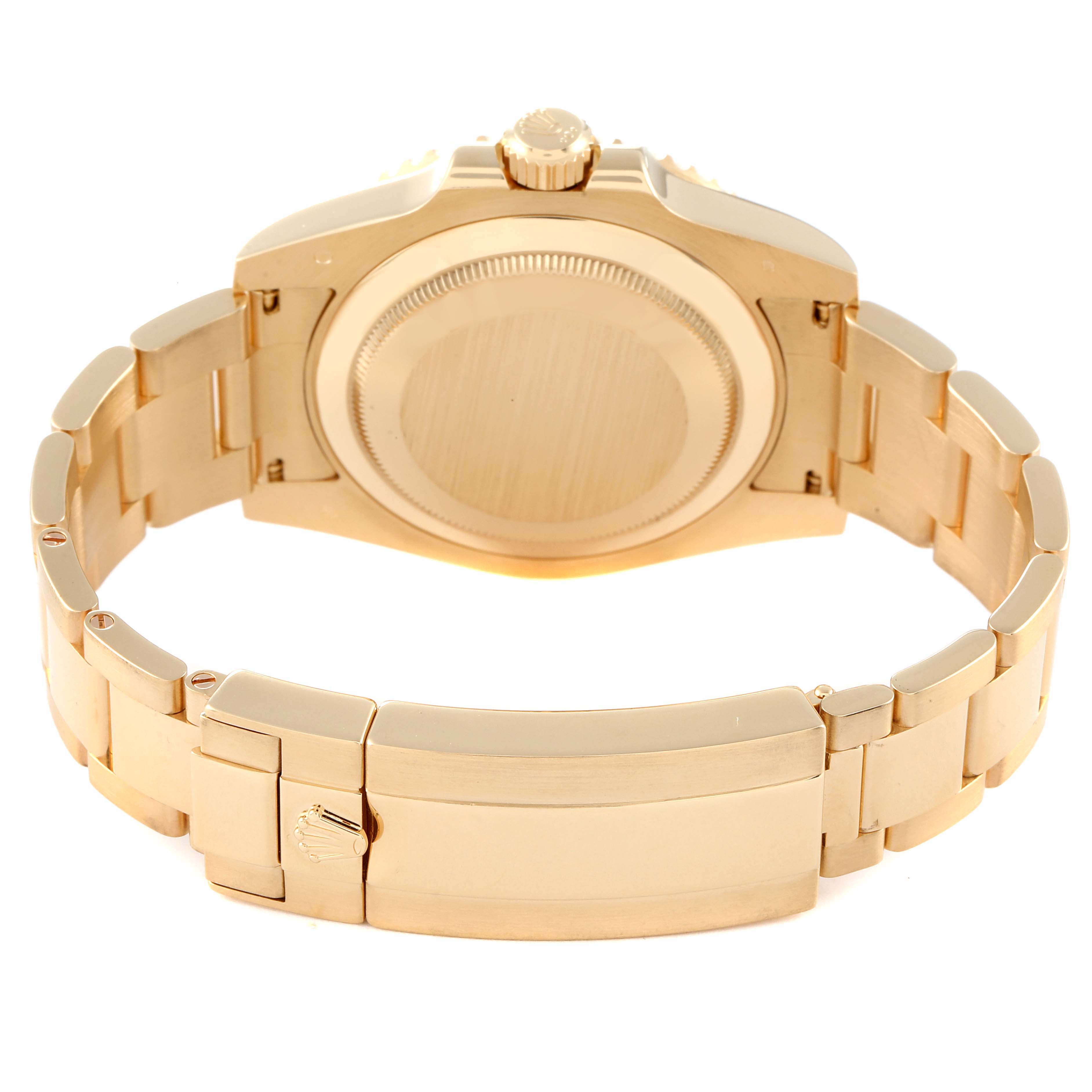 The image shows the back view of the Rolex Submariner 116618 Men's Yellow Gold Black Dial 116618 Men's Yellow Gold Black Dial, focusing on the case back and gold bracelet with the clasp.