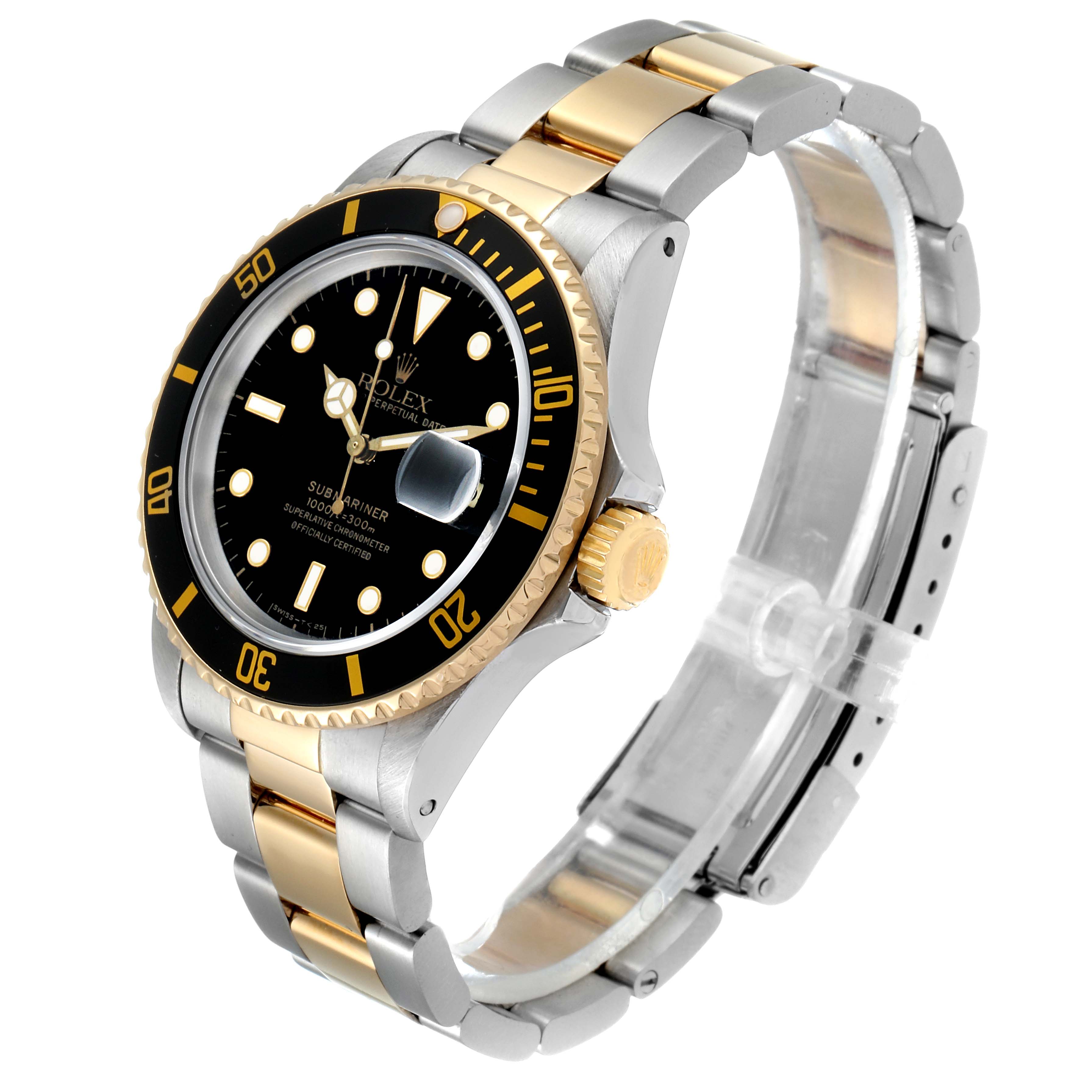 This image shows a Rolex Submariner 16803 Men's Steel and Gold (two tone) Black Dial 16803 Men's Steel and Gold (two tone) Black Dial watch at a front-side angle, highlighting the black dial, gold accents, and two-tone bracelet.
