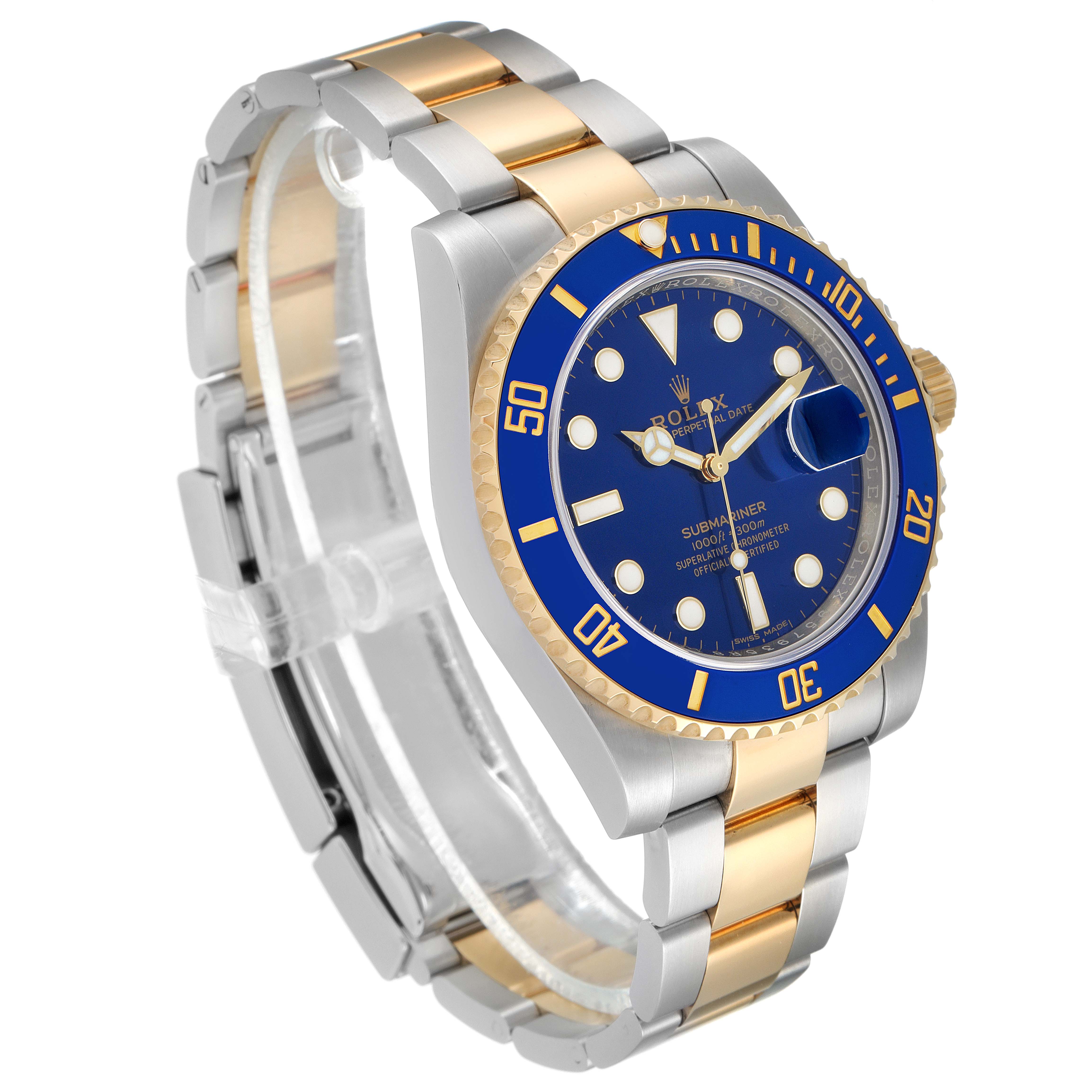 The image shows a Rolex Submariner 116613 Men
s Steel and Gold (two tone) Blue Dial 116613 Men
s Steel and Gold (two tone) Blue Dial watch at an angled view, highlighting its blue dial, bezel, and two-tone bracelet.