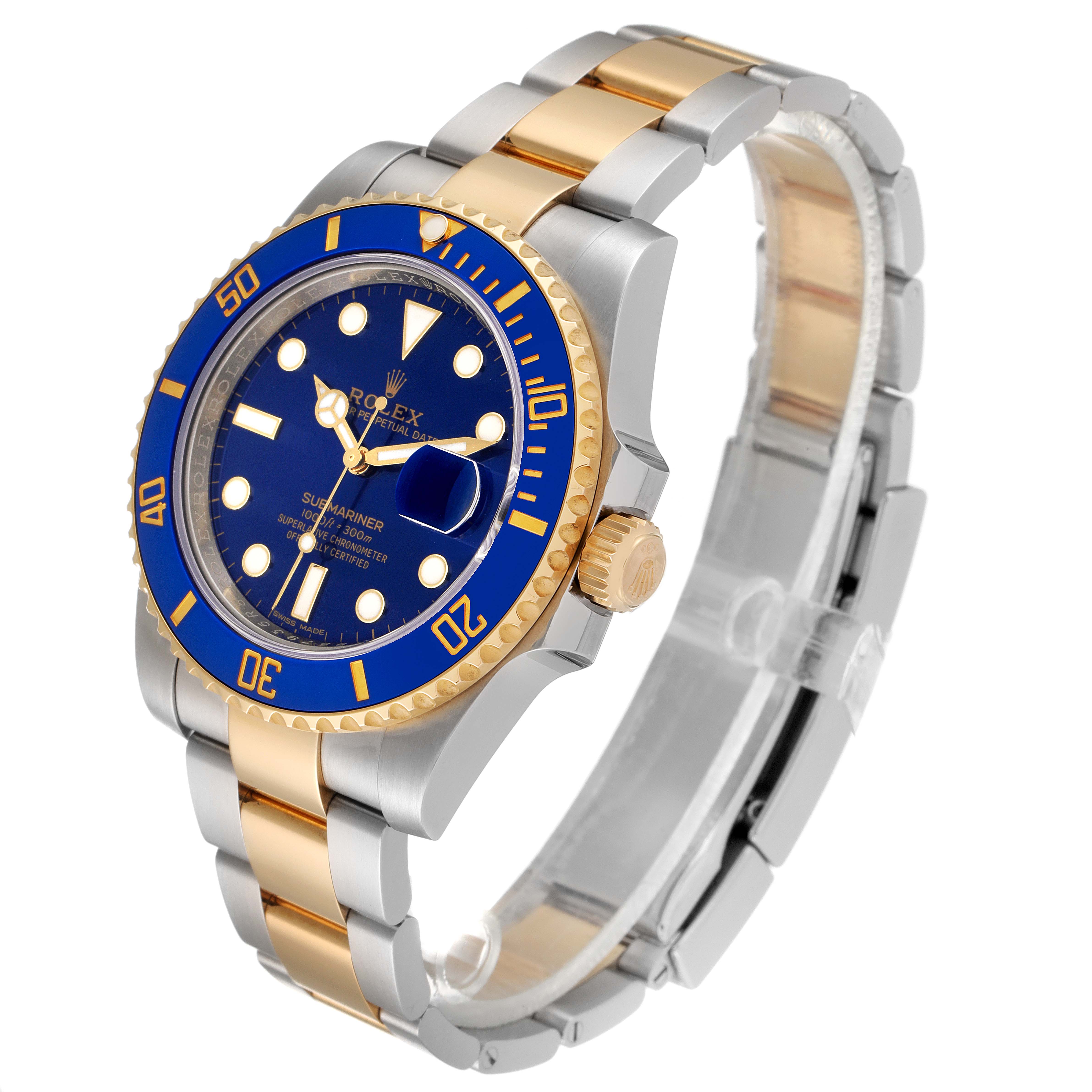 The Rolex Submariner 116613 Men
s Steel and Gold (two tone) Blue Dial 116613 Men
s Steel and Gold (two tone) Blue Dial watch is shown at a slight angle, displaying its blue dial, bezel, gold crown, and two-tone bracelet.