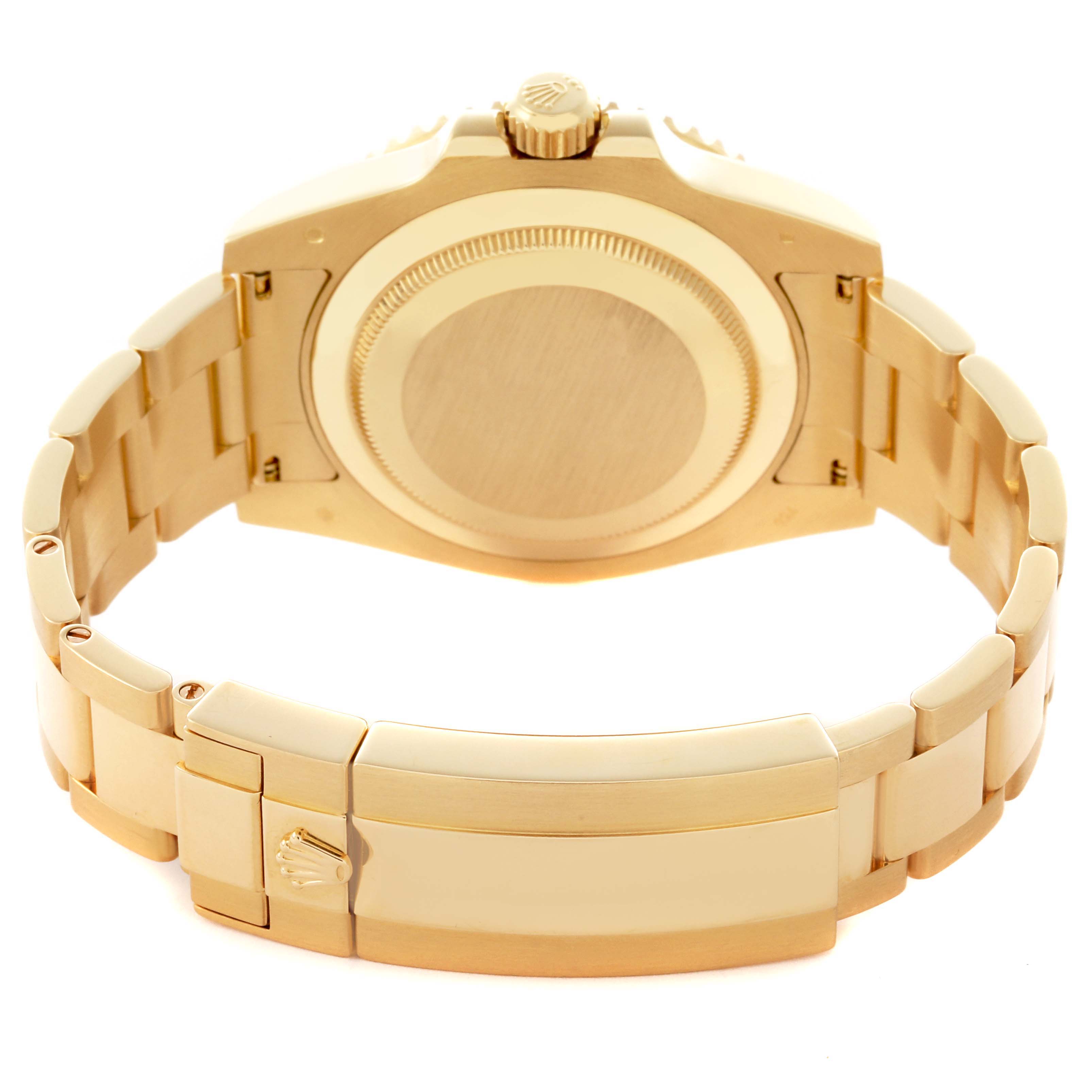 The image shows the back view of a Rolex Submariner 116618LB Men's Yellow Gold Blue Dial 116618LB Men's Yellow Gold Blue Dial, highlighting the clasp and bracelet.