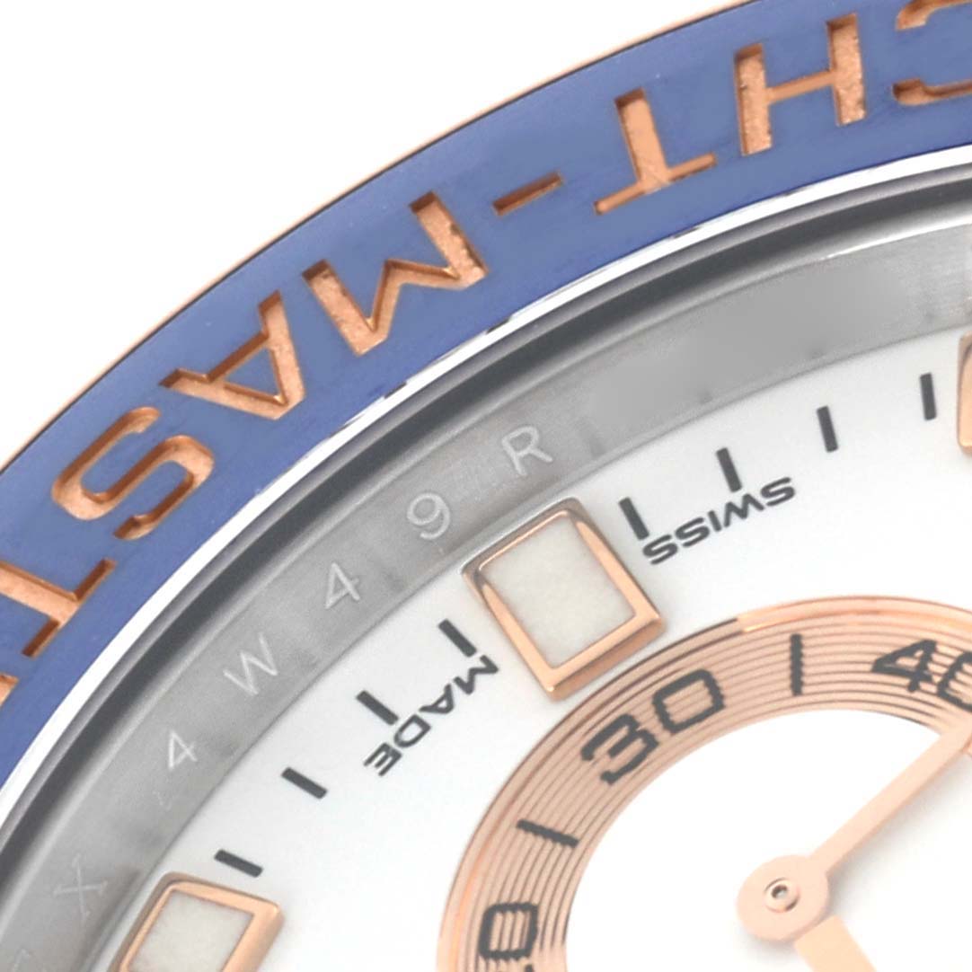 This close-up shows the bezel and part of the dial of a Rolex Yacht-Master 116681 Men
s Steel and Gold (two tone) White Dial 116681 Men
s Steel and Gold (two tone) White Dial watch.