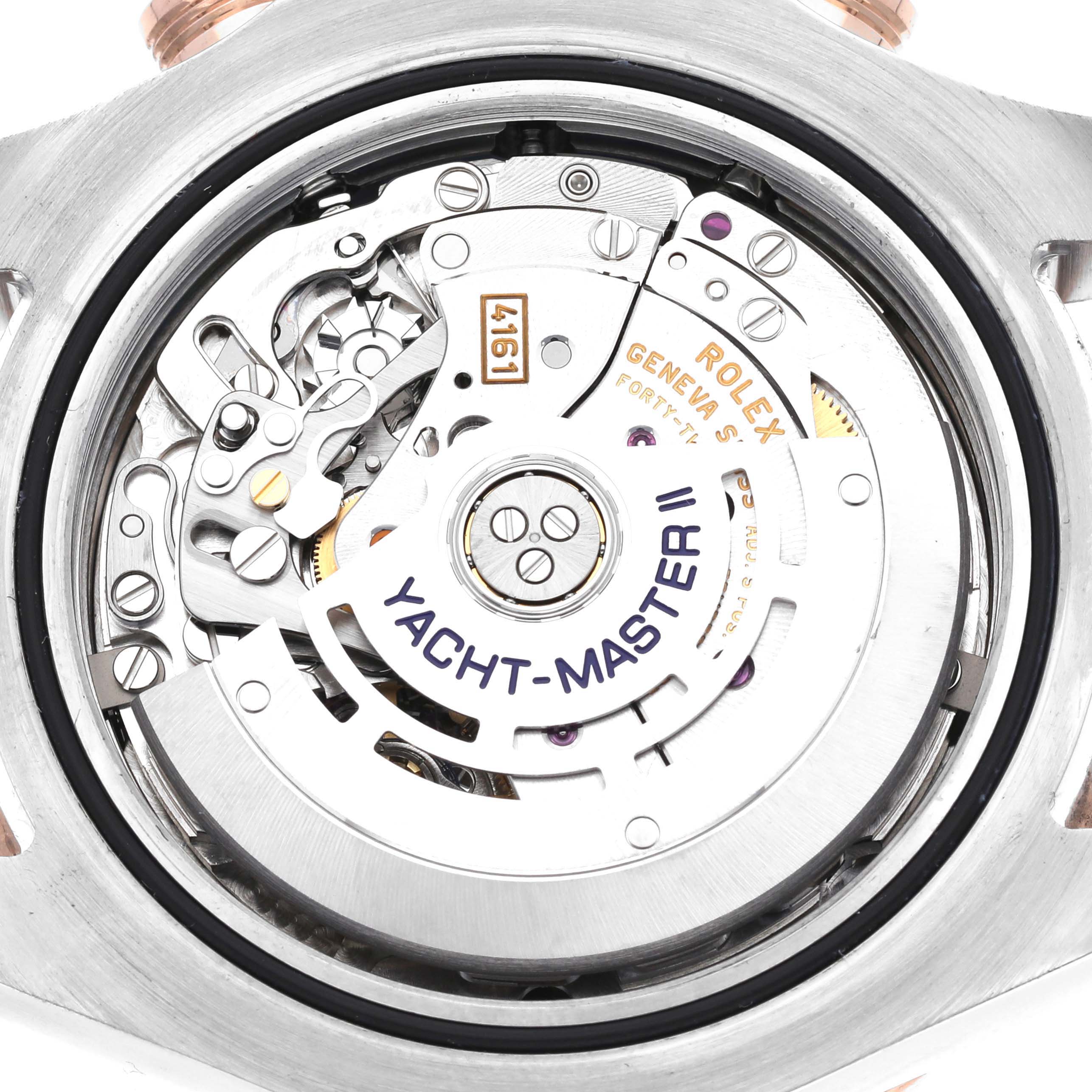 The image shows a close-up of the movement inside the Rolex Yacht-Master 116681 Men
s Steel and Gold (two tone) White Dial 116681 Men
s Steel and Gold (two tone) White Dial II watch.