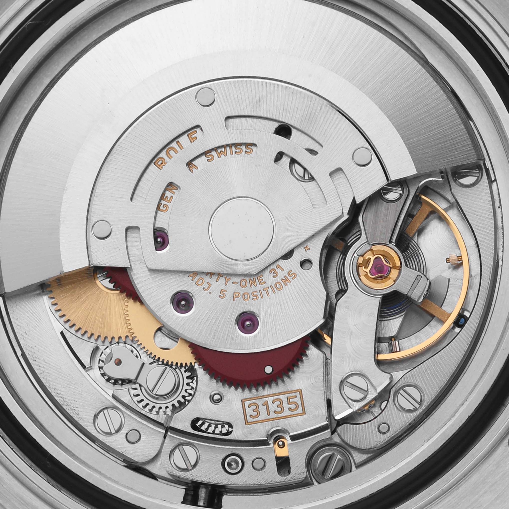 The image shows the intricate internal mechanism of the Rolex Yacht-Master 16623 Men's Steel and Gold (two tone) White Dial 16623 Men's Steel and Gold (two tone) White Dial watch, highlighting gears and balance components.