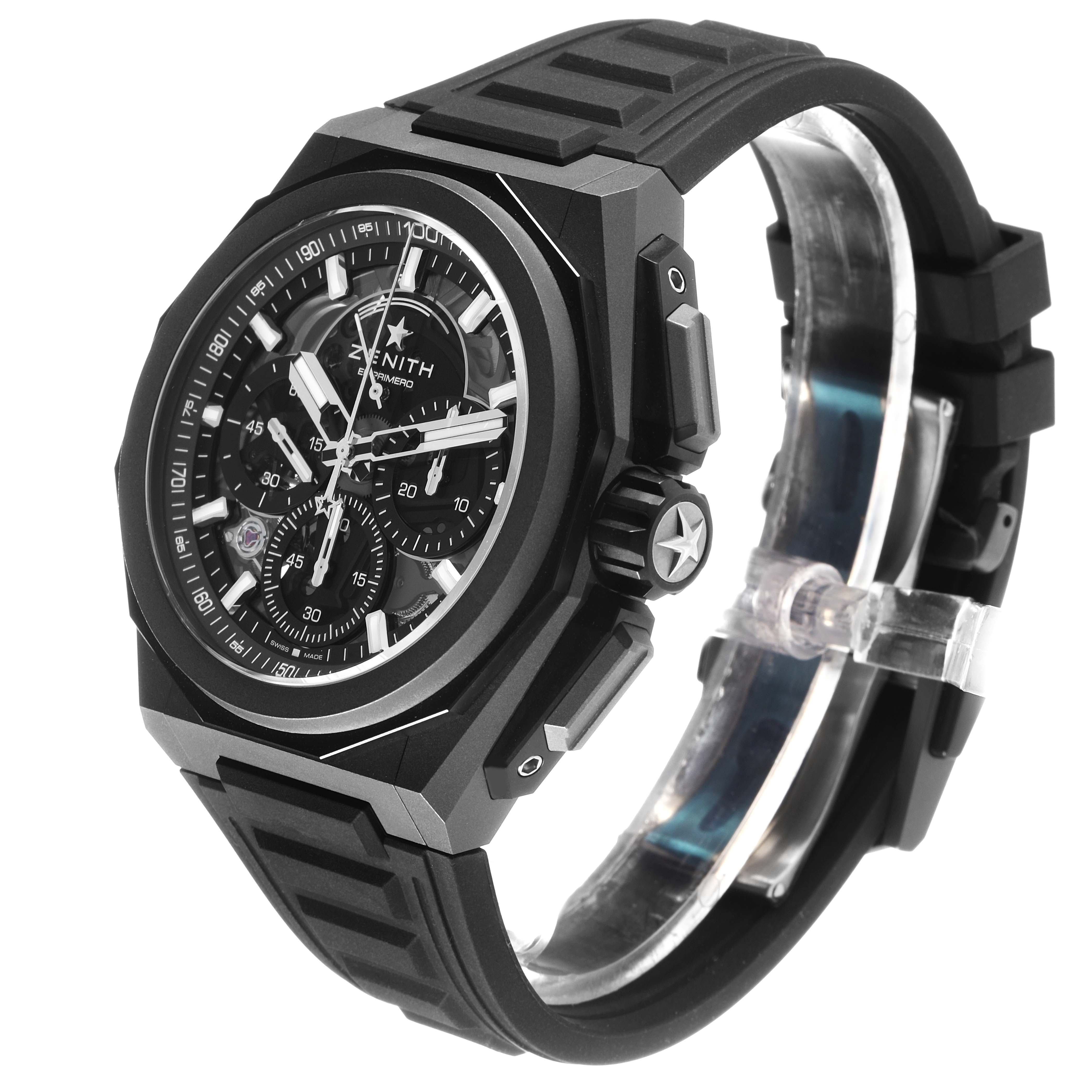 The Zenith Defy 97.9100.9004/02.I001 Men's Titanium Grey Dial watch is shown at a slight angle, revealing the face, bezel, and rubber strap.