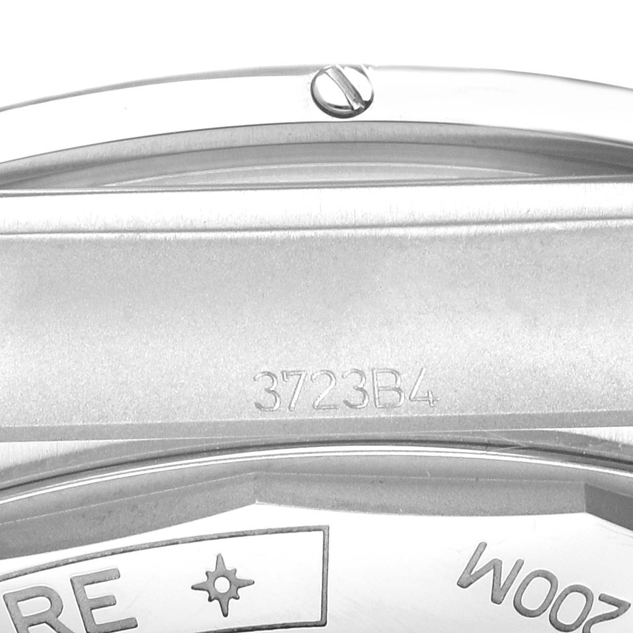 The image shows the side profile of a Breitling Chronomat AB0134101C1A1 Men's Stainless Steel Blue Dial watch, highlighting the casing with engraved markings.