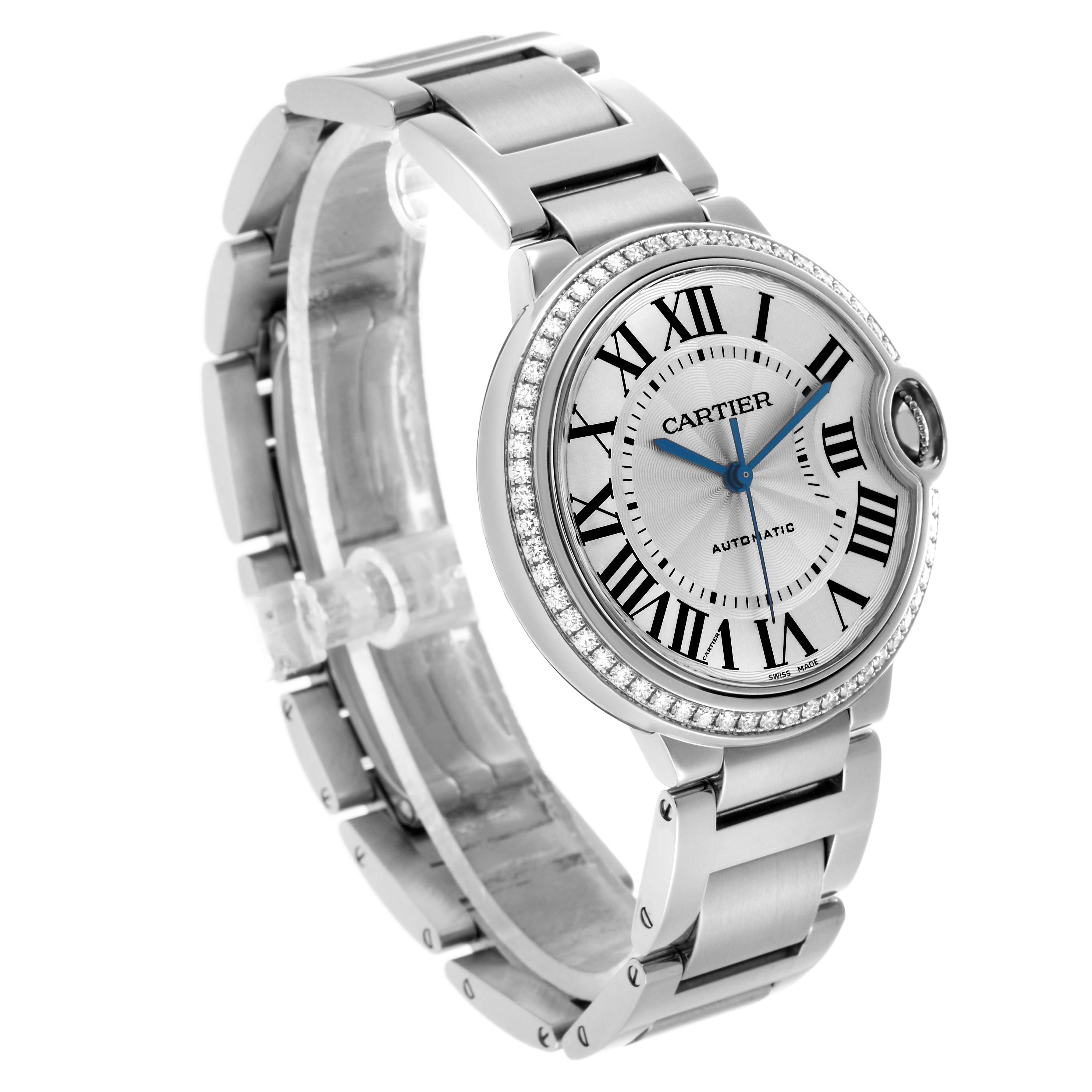 The Cartier Ballon Bleu W4BB0023 Women's Stainless Steel Silver Dial watch is shown at a three-quarter angle, highlighting its round face, Roman numerals, and bracelet.