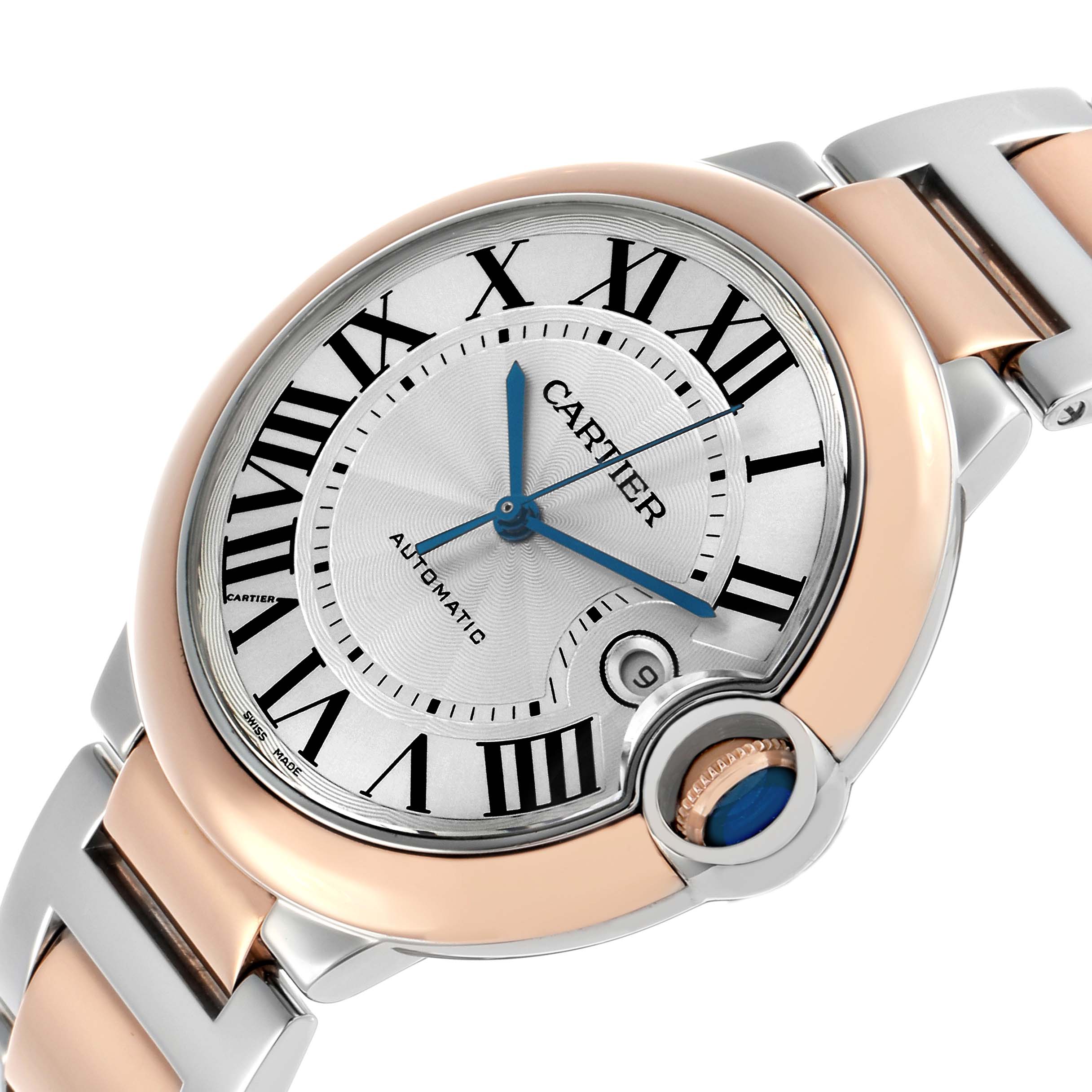The Cartier Ballon Bleu W2BB0004 Men's Steel and Gold (two tone) Silver Dial watch is shown at an angle highlighting the face, crown, and partial bracelet.