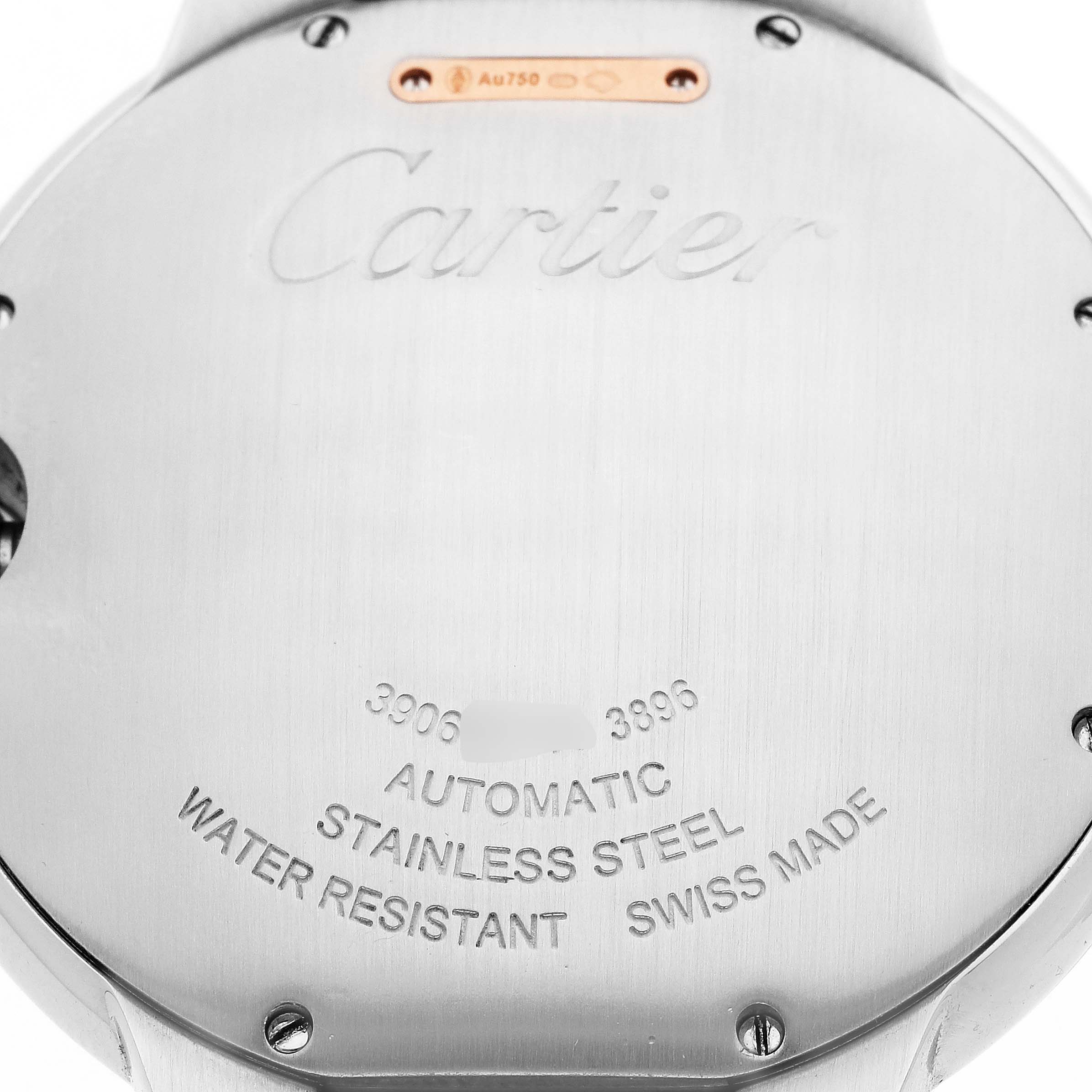 The image shows the back casing of a Cartier Ballon Bleu W2BB0004 Men's Steel and Gold (two tone) Silver Dial watch, highlighting its model details and engravings.