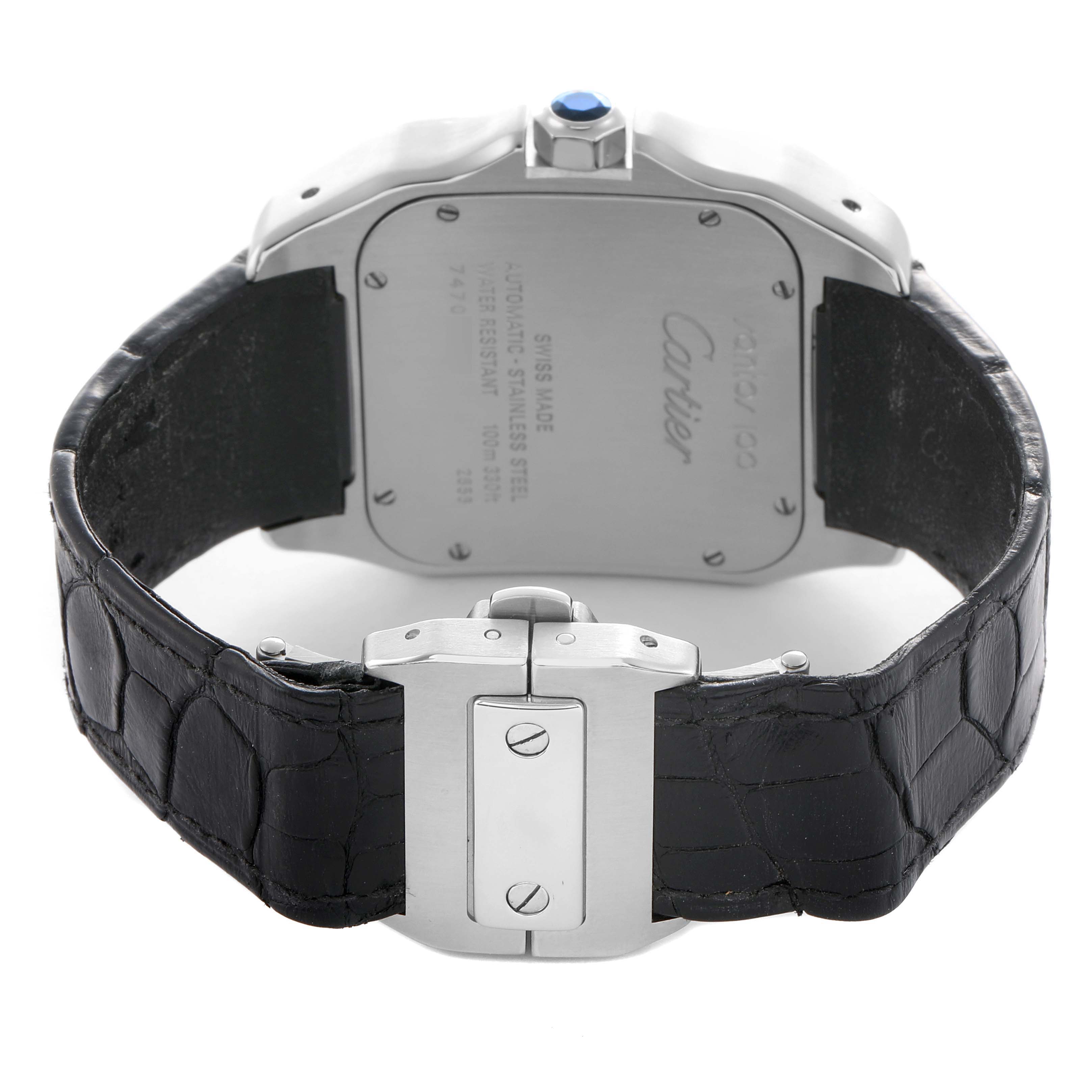 The image shows the back and clasp of the Cartier Santos W20073X8 Men's Stainless Steel Silver Dial watch, highlighting the stainless steel caseback and black leather strap.