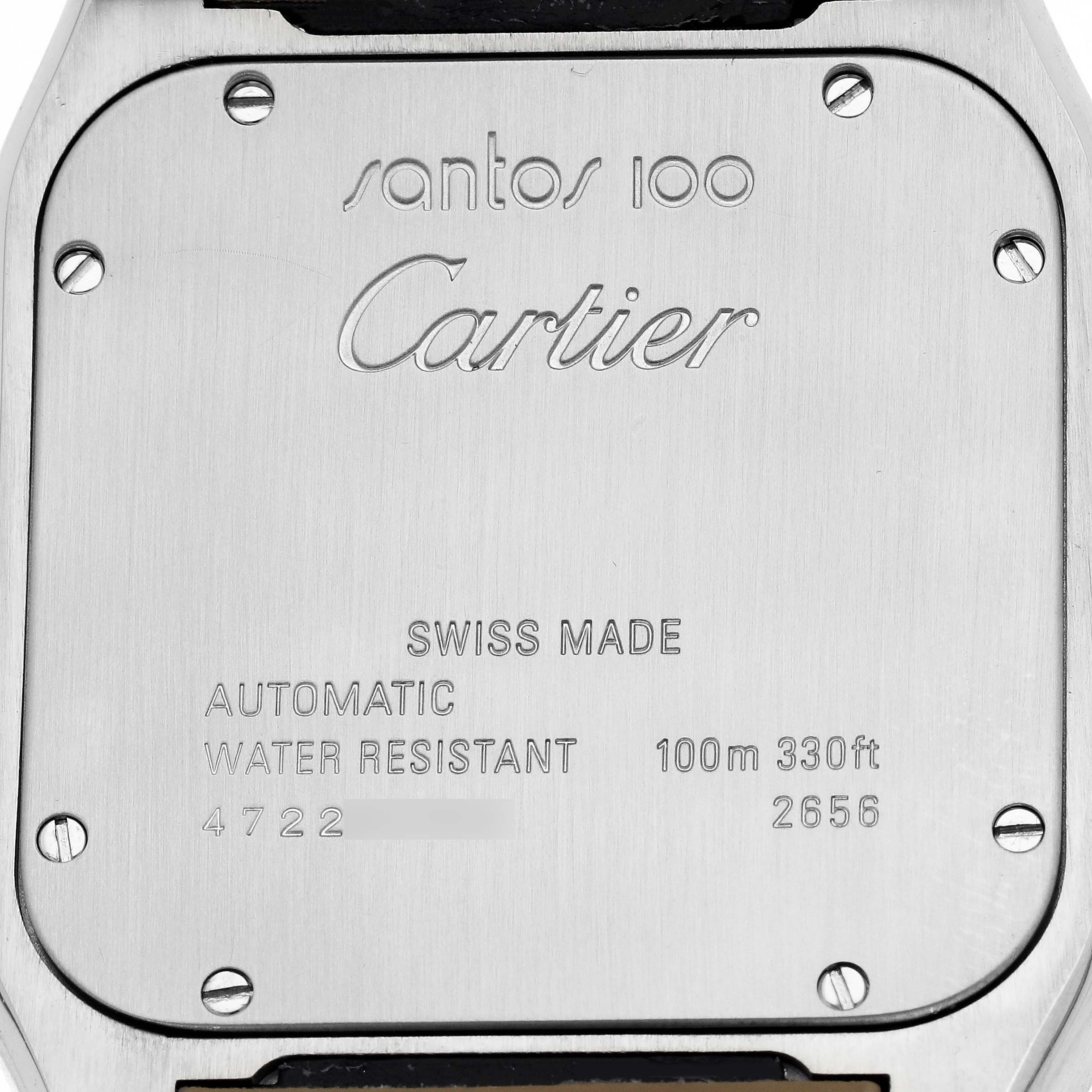 The image shows the back of a Cartier Santos W20072X7 Men's Stainless Steel Silver Dial 100 watch, highlighting engravings and screws.