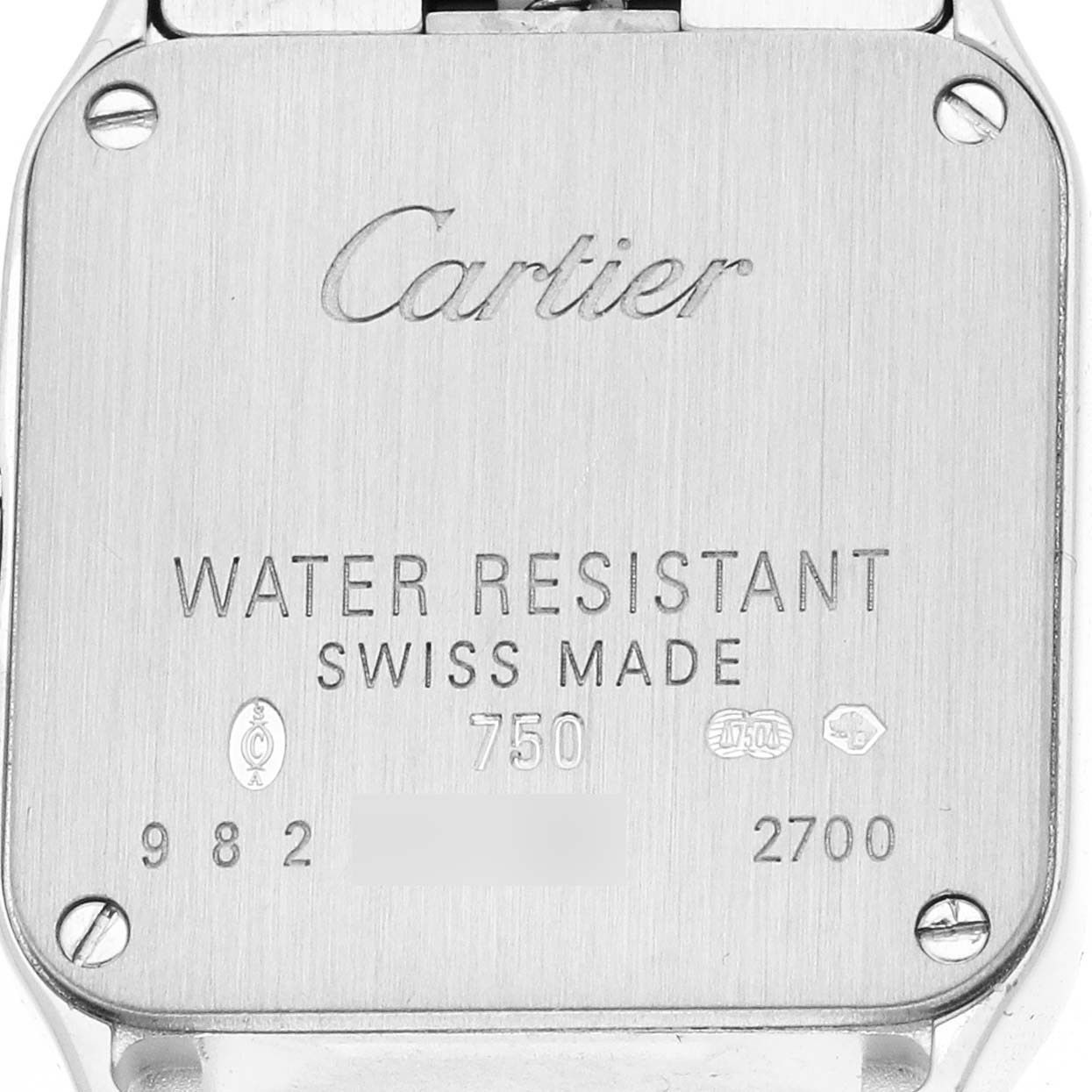 The image shows the back cover of the Cartier Santos Demoiselle WF9005Y8 Women's White Gold Silver Dial watch with engravings indicating water resistance and Swiss origin.