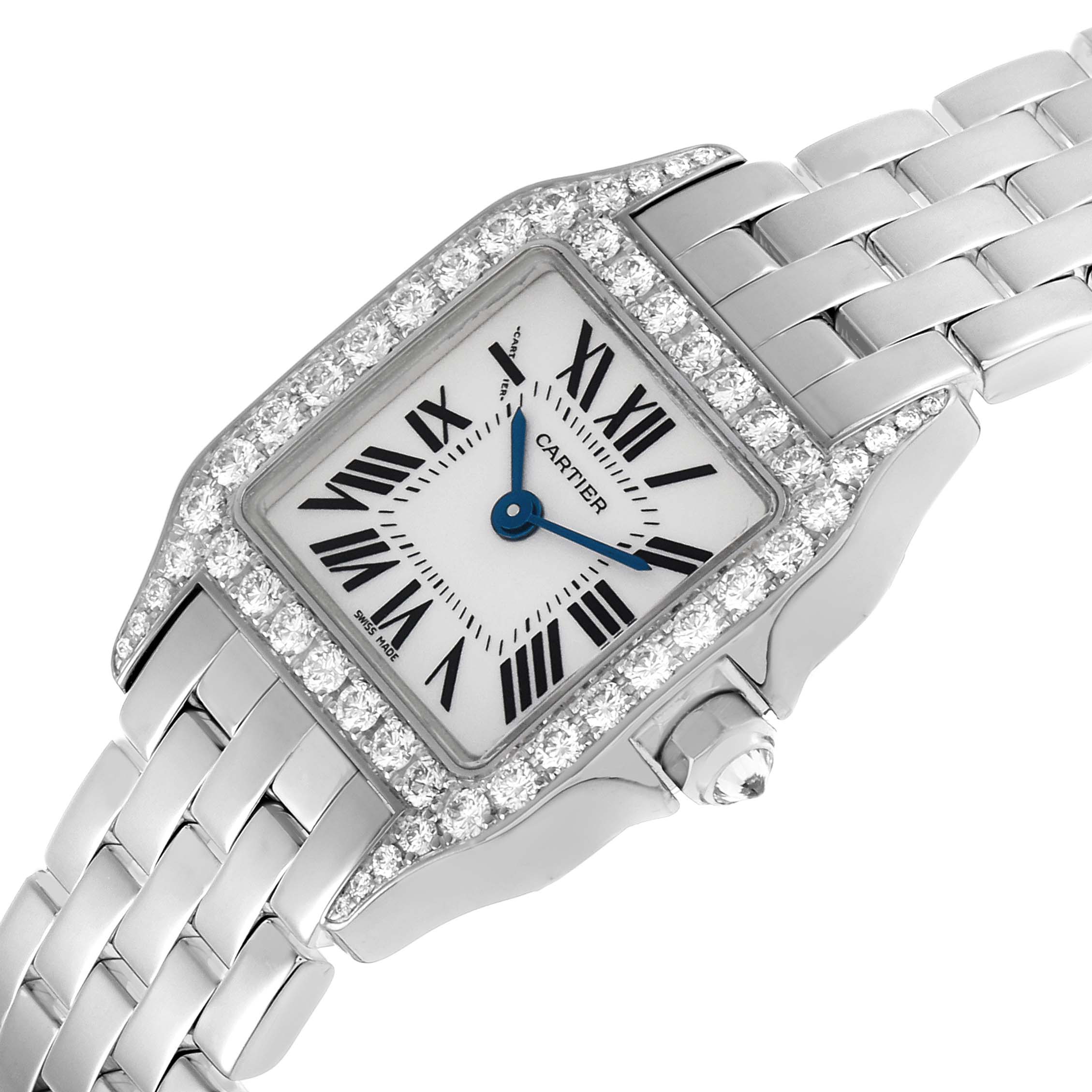 The Cartier Santos Demoiselle WF9005Y8 Women's White Gold Silver Dial watch is shown at an angled view, highlighting its diamond-encrusted bezel, square face, and metal bracelet.