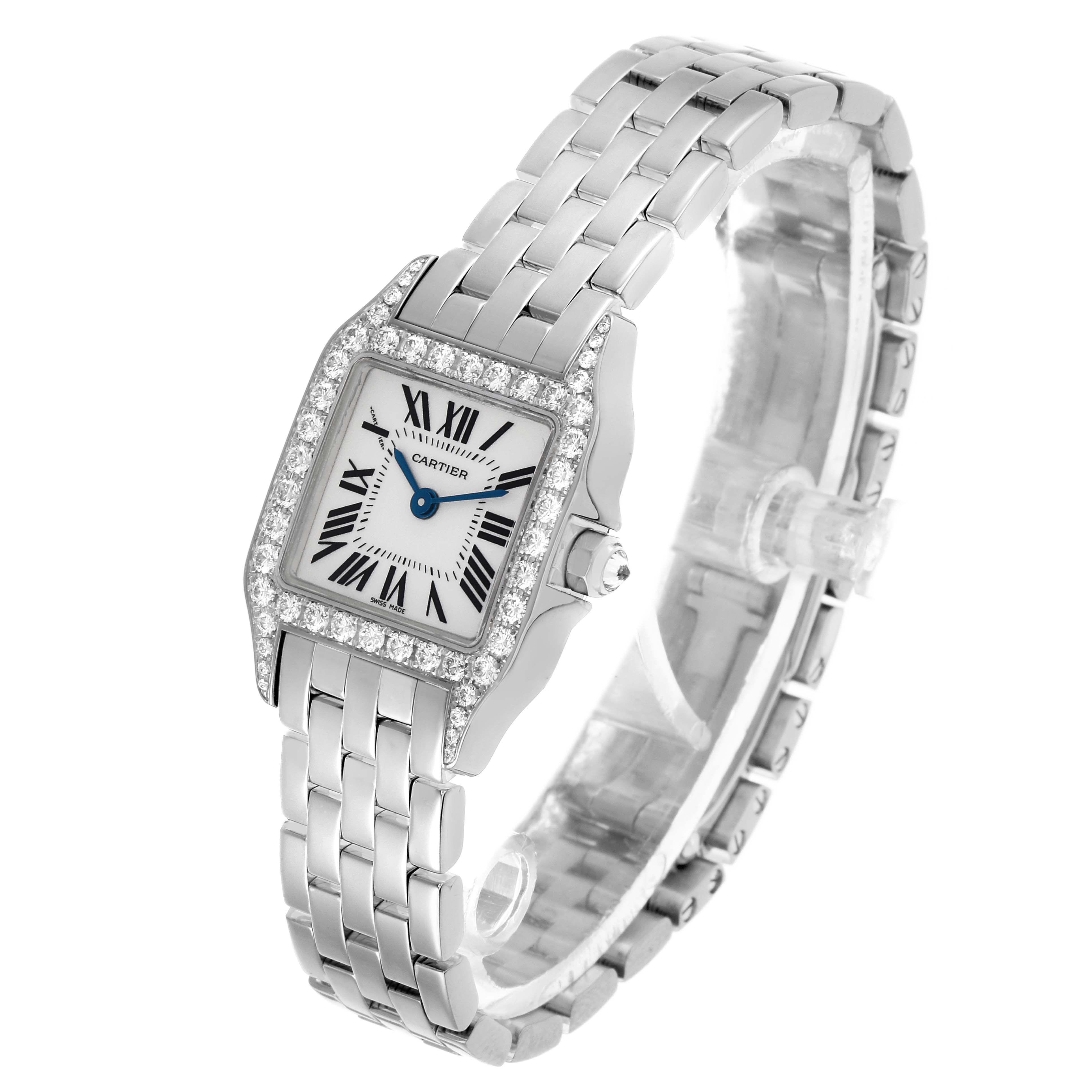 The Cartier Santos Demoiselle WF9005Y8 Women's White Gold Silver Dial watch is shown at a three-quarter angle, highlighting its diamond-set bezel and linked bracelet.