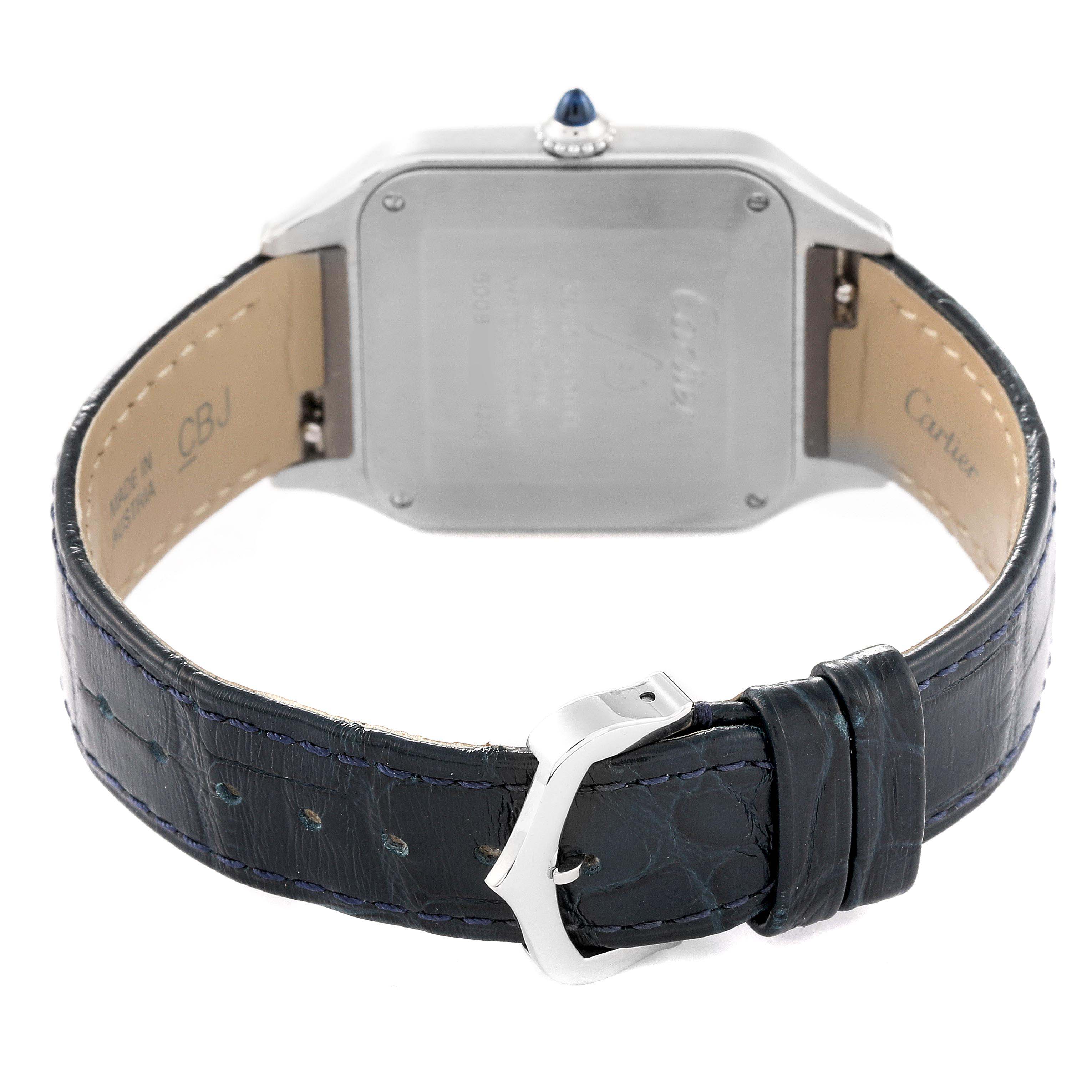 The image shows the back view of a Cartier Santos Dumont WSSA0022 Men's Stainless Steel Silver Dial WSSA0022 Men's Stainless Steel Silver Dial watch, highlighting its case back and leather strap with a silver buckle.